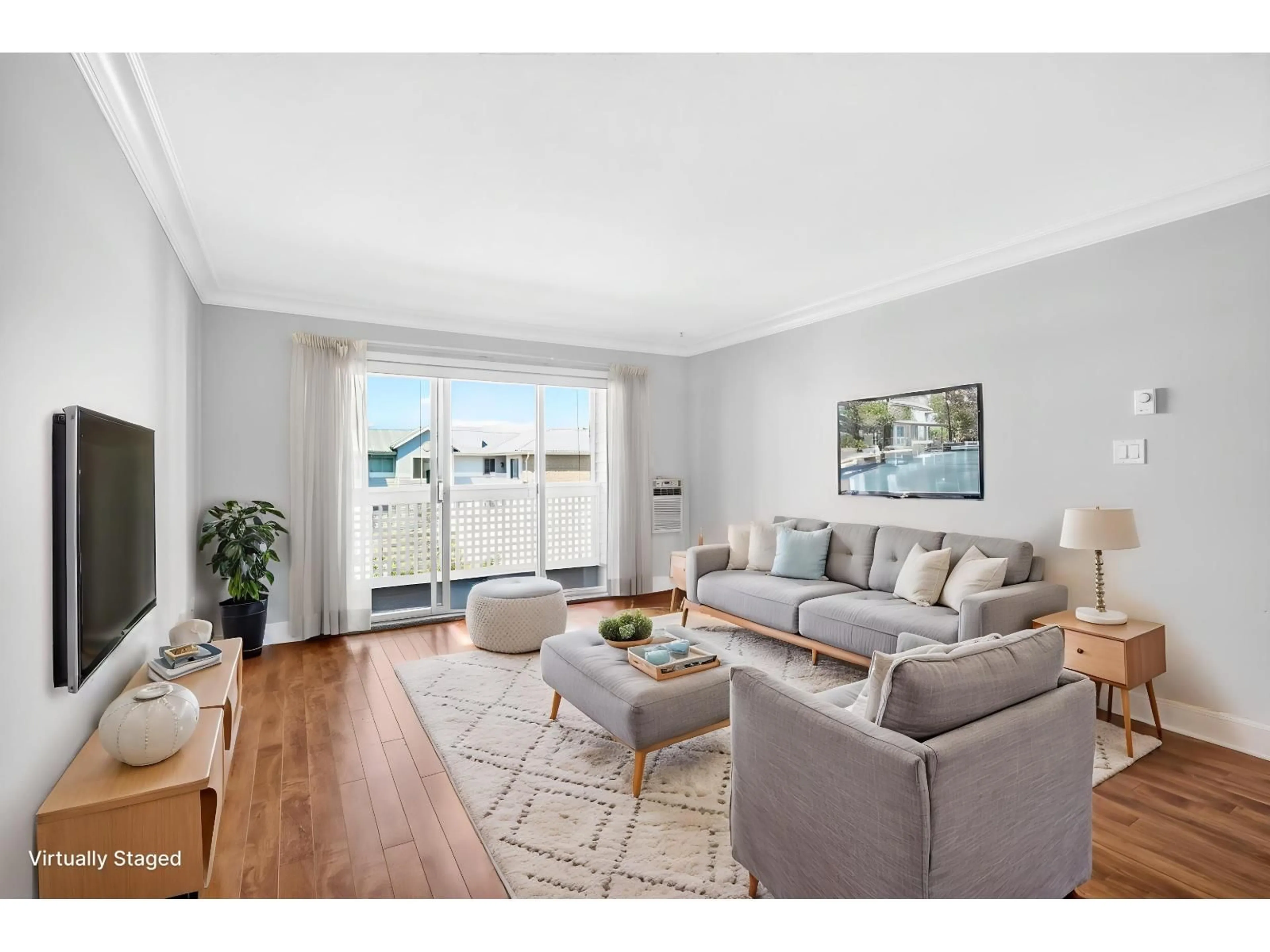 Living room with furniture, wood/laminate floor for 311 - 32833 LANDEAU PLACE, Abbotsford British Columbia V2S6S6