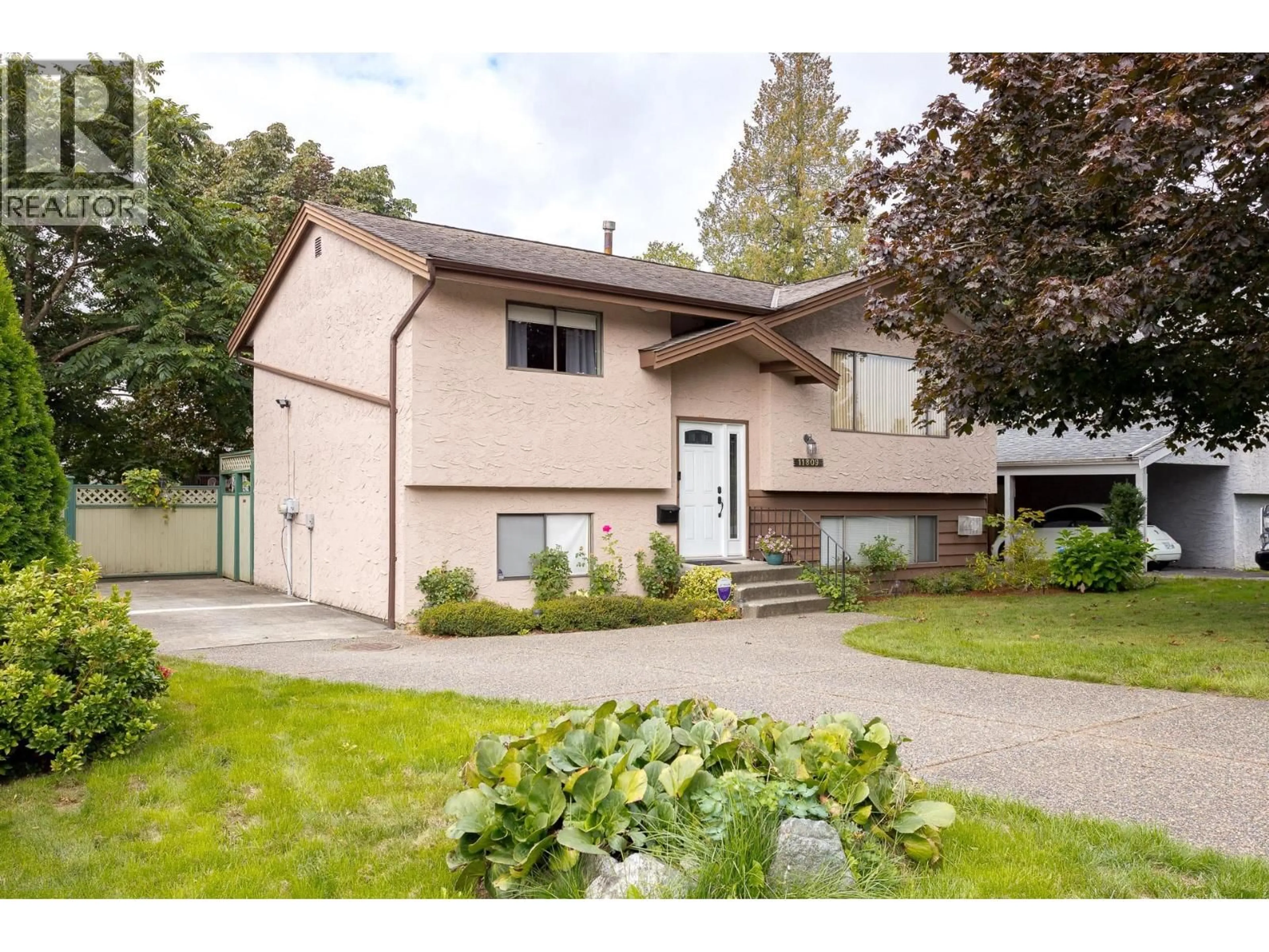 Home with vinyl exterior material, street for 11809 230 STREET, Maple Ridge British Columbia V2X6R3