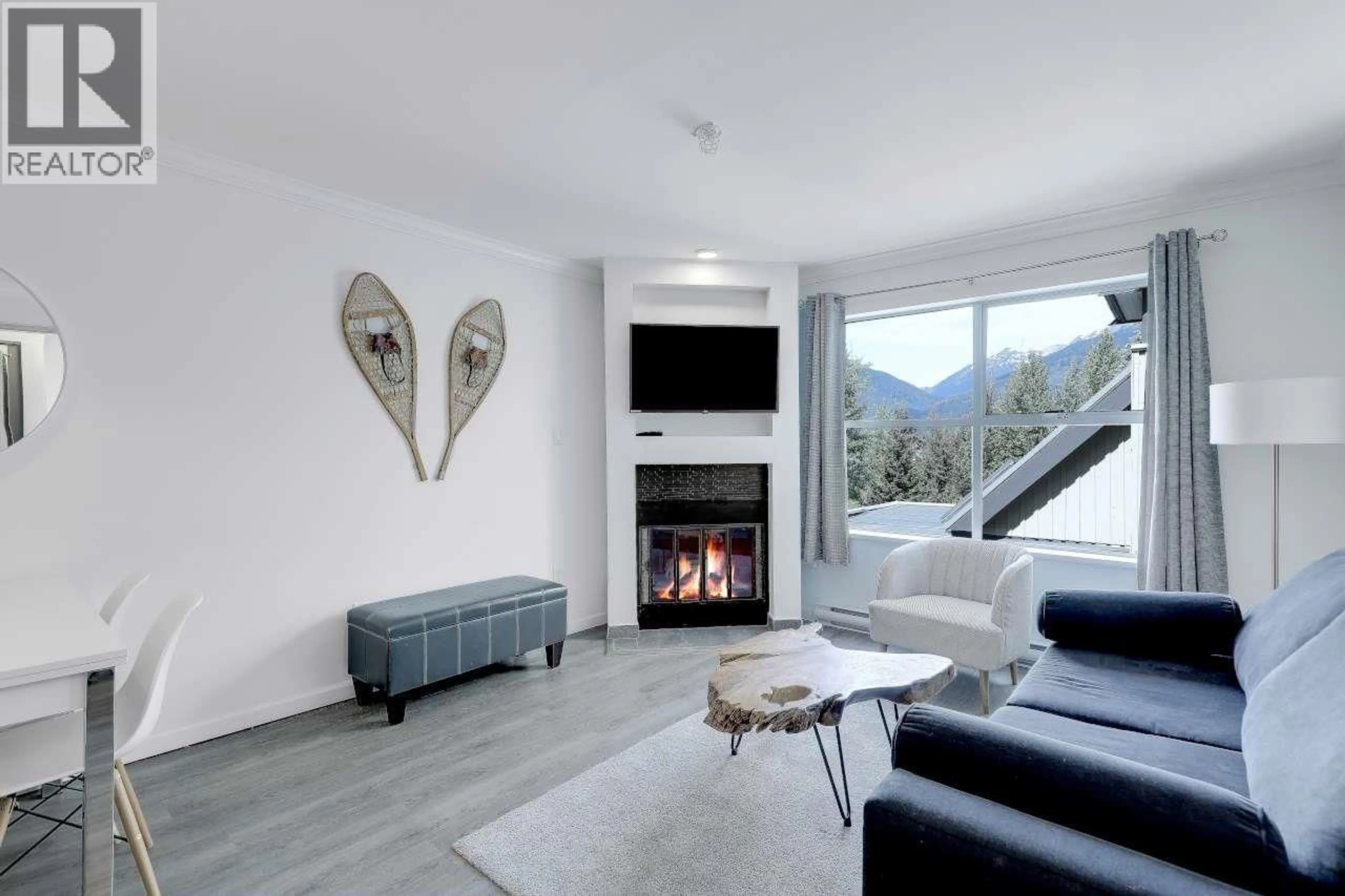 Living room with furniture, unknown for 217 - 4749 SPEARHEAD DRIVE, Whistler British Columbia V8E1E9