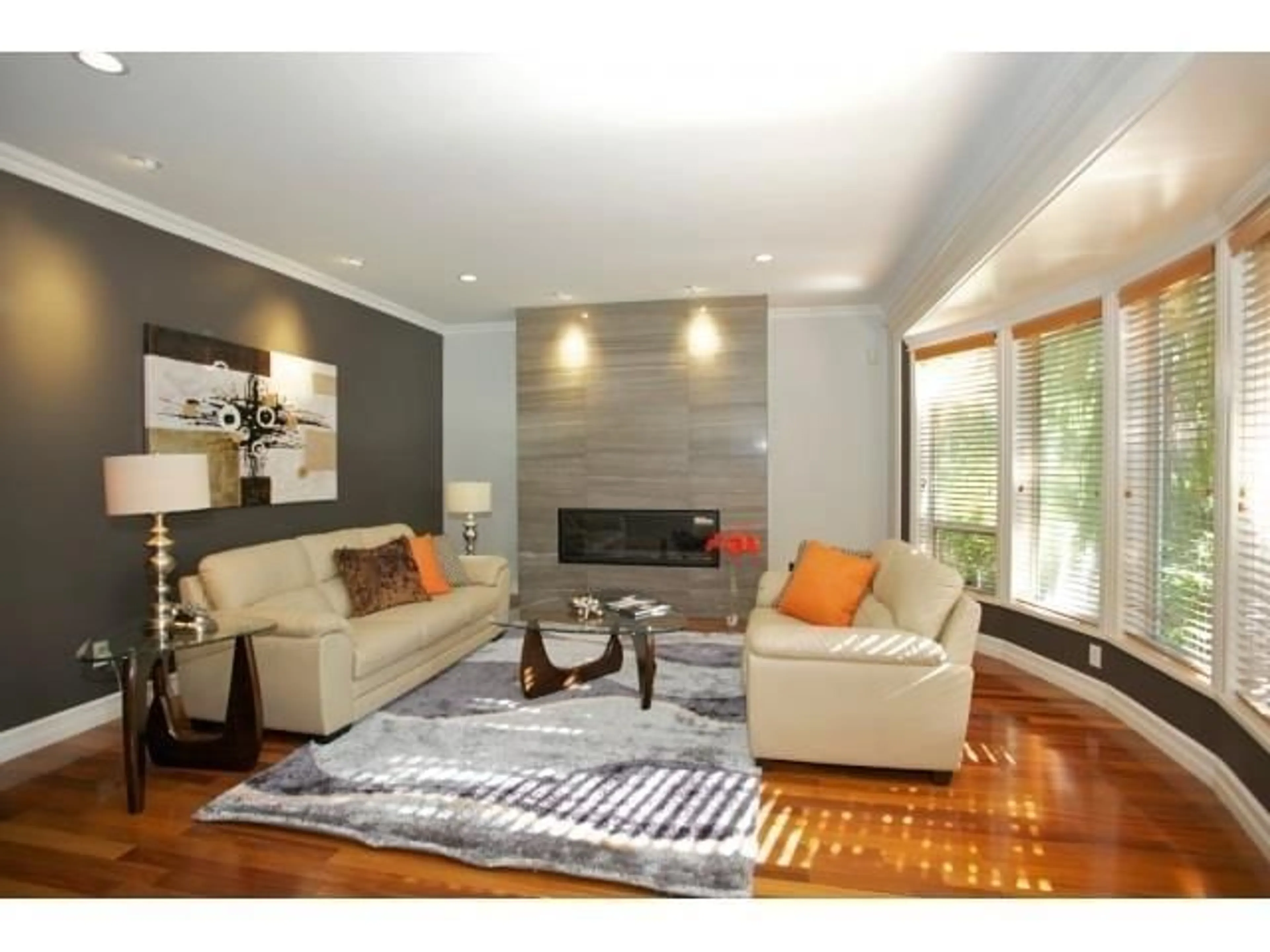 Living room with furniture, wood/laminate floor for 18171 72 AVENUE, Surrey British Columbia V4N3G6