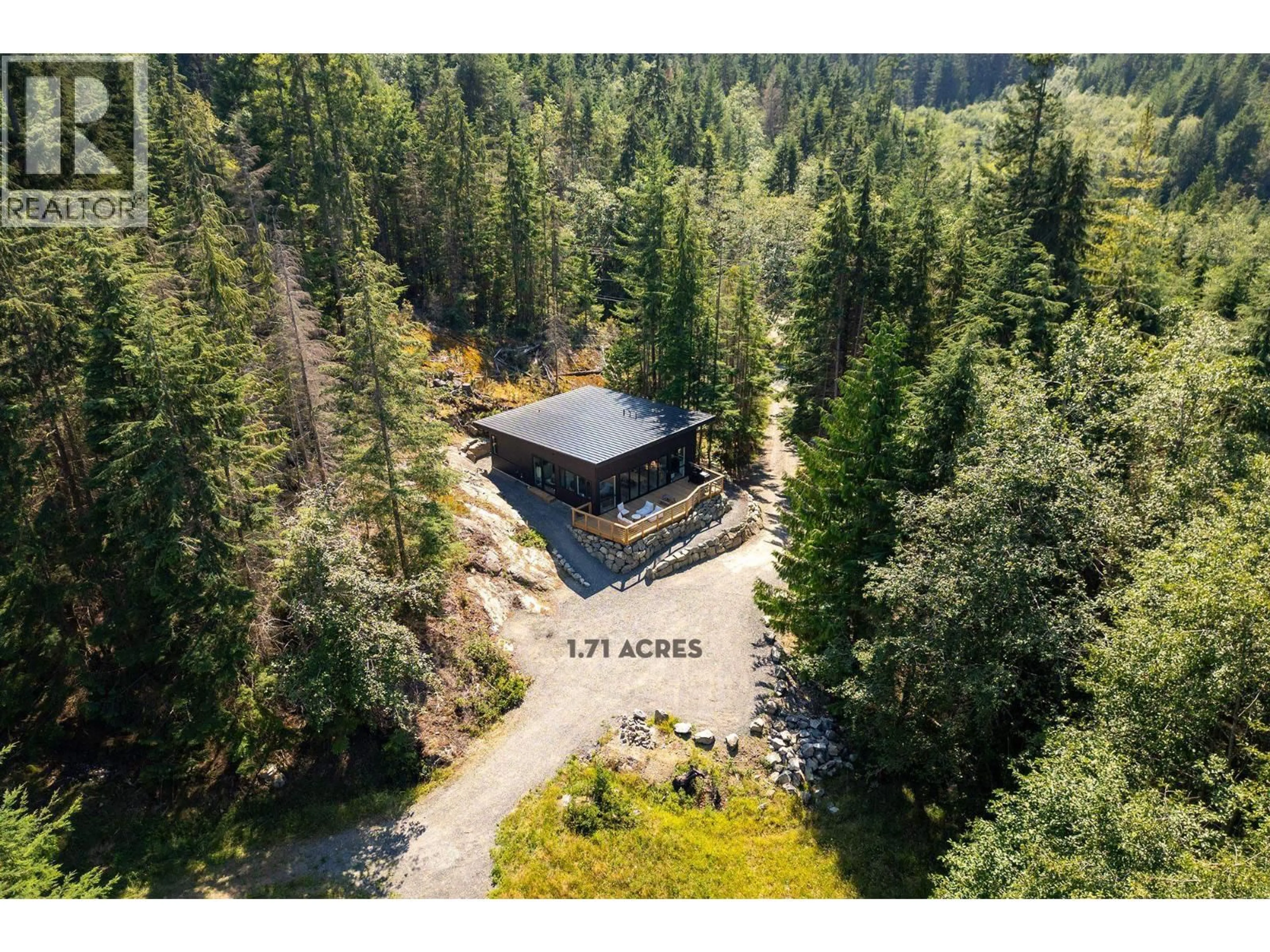 A pic from outside/outdoor area/front of a property/back of a property/a pic from drone, forest/trees view for 1290 COWAN POINT DRIVE, Bowen Island British Columbia V0N1G2
