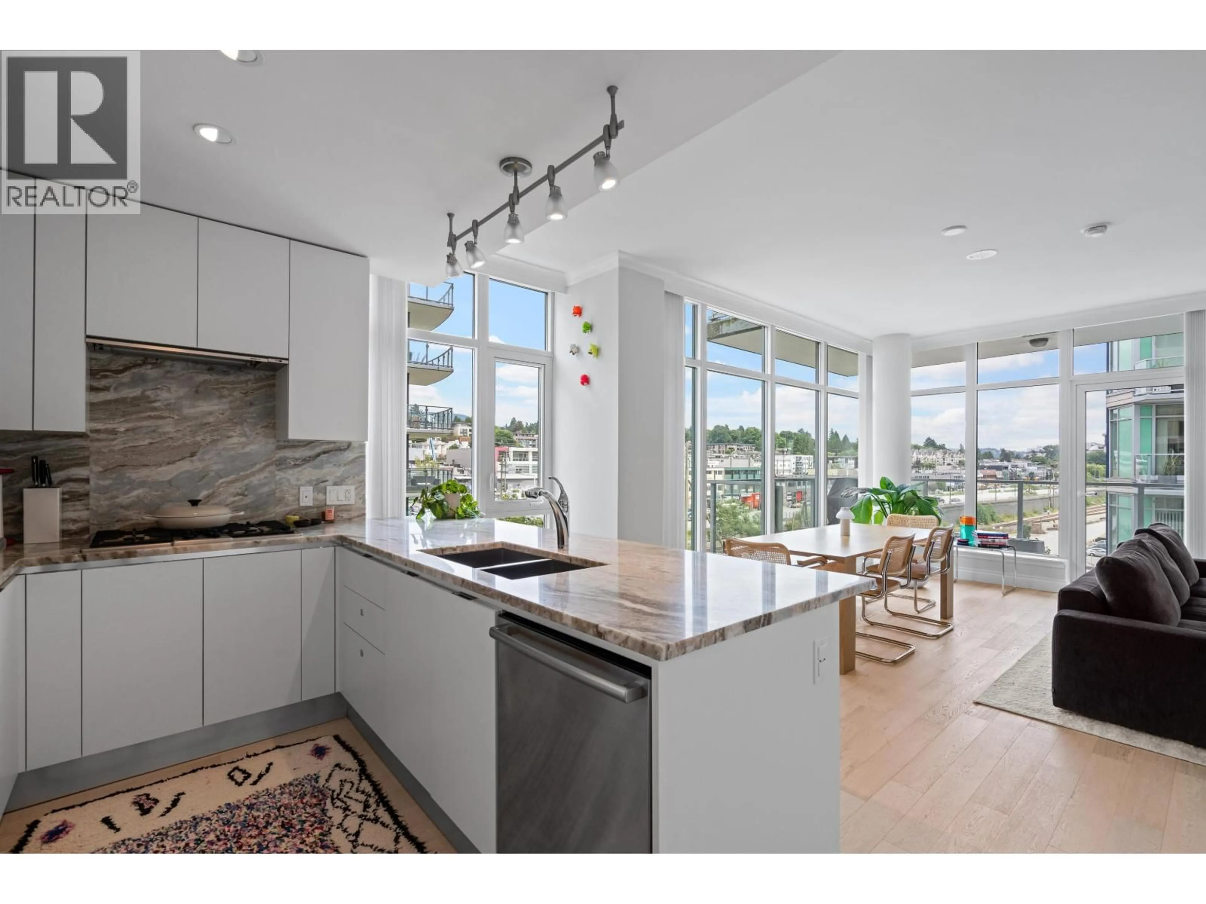 Open concept kitchen, unknown for 609 - 185 VICTORY SHIP WAY, North Vancouver British Columbia V7L0G2