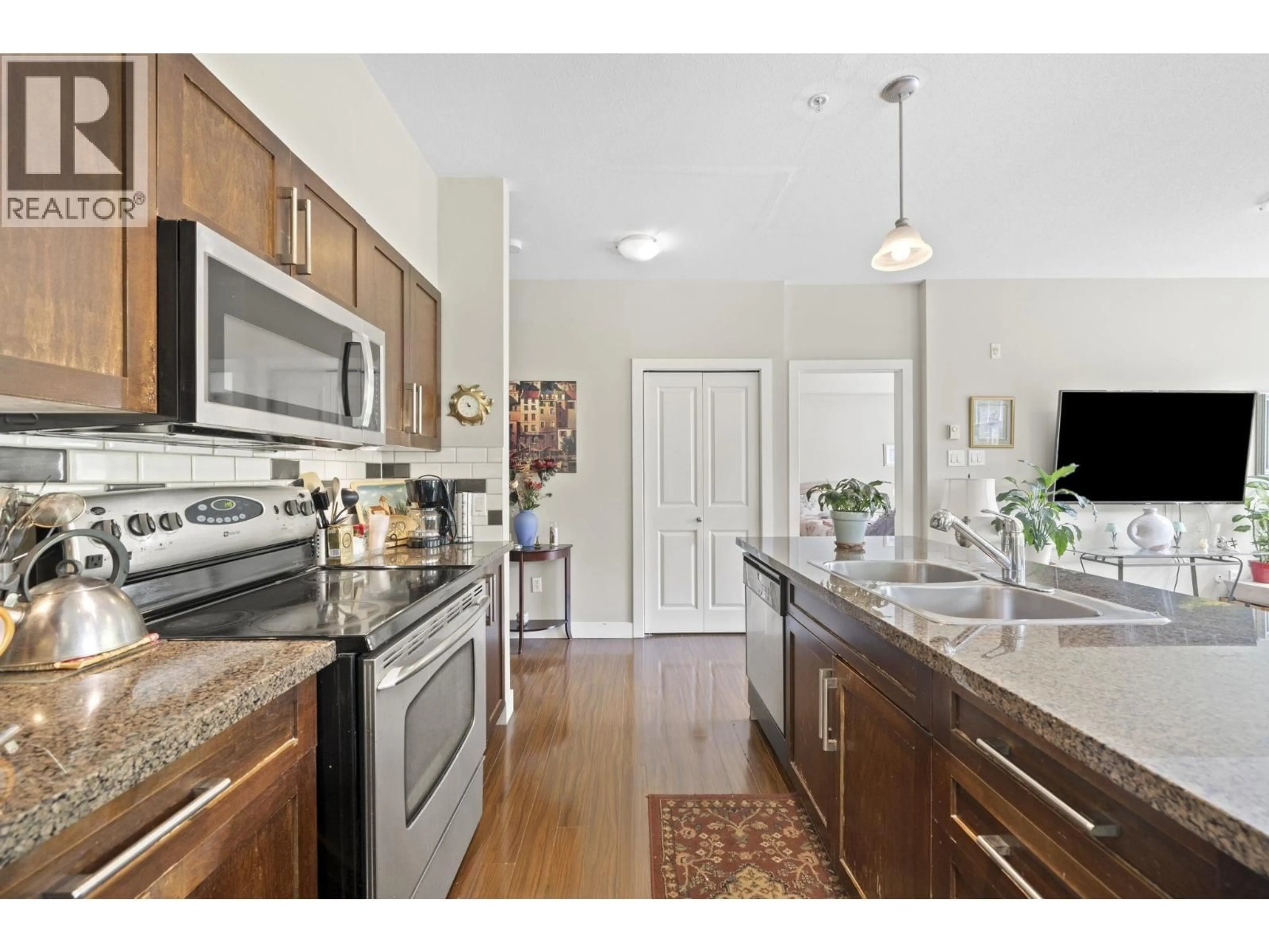 Open concept kitchen, unknown for 211 - 2353 MARPOLE AVENUE, Port Coquitlam British Columbia V3C2A1