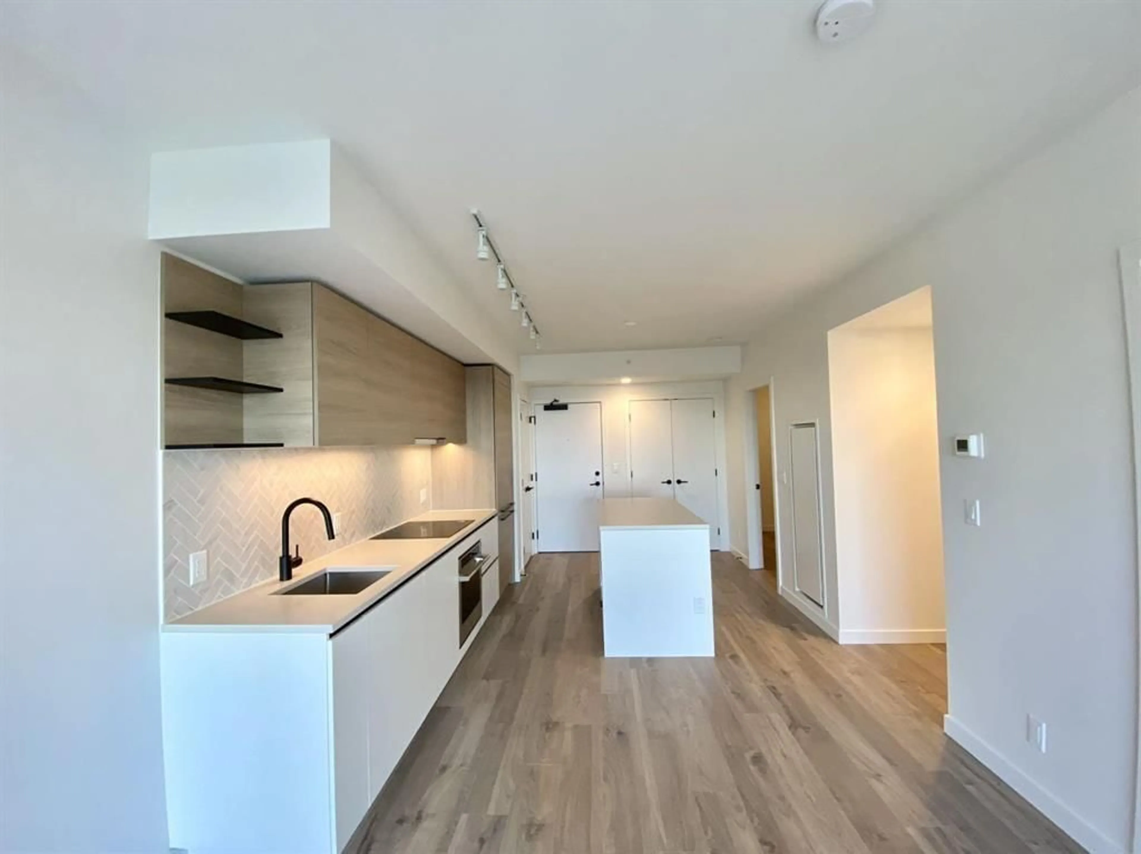 Open concept kitchen, unknown for 1801 - 13428 105 AVENUE, Surrey British Columbia V3T0S6