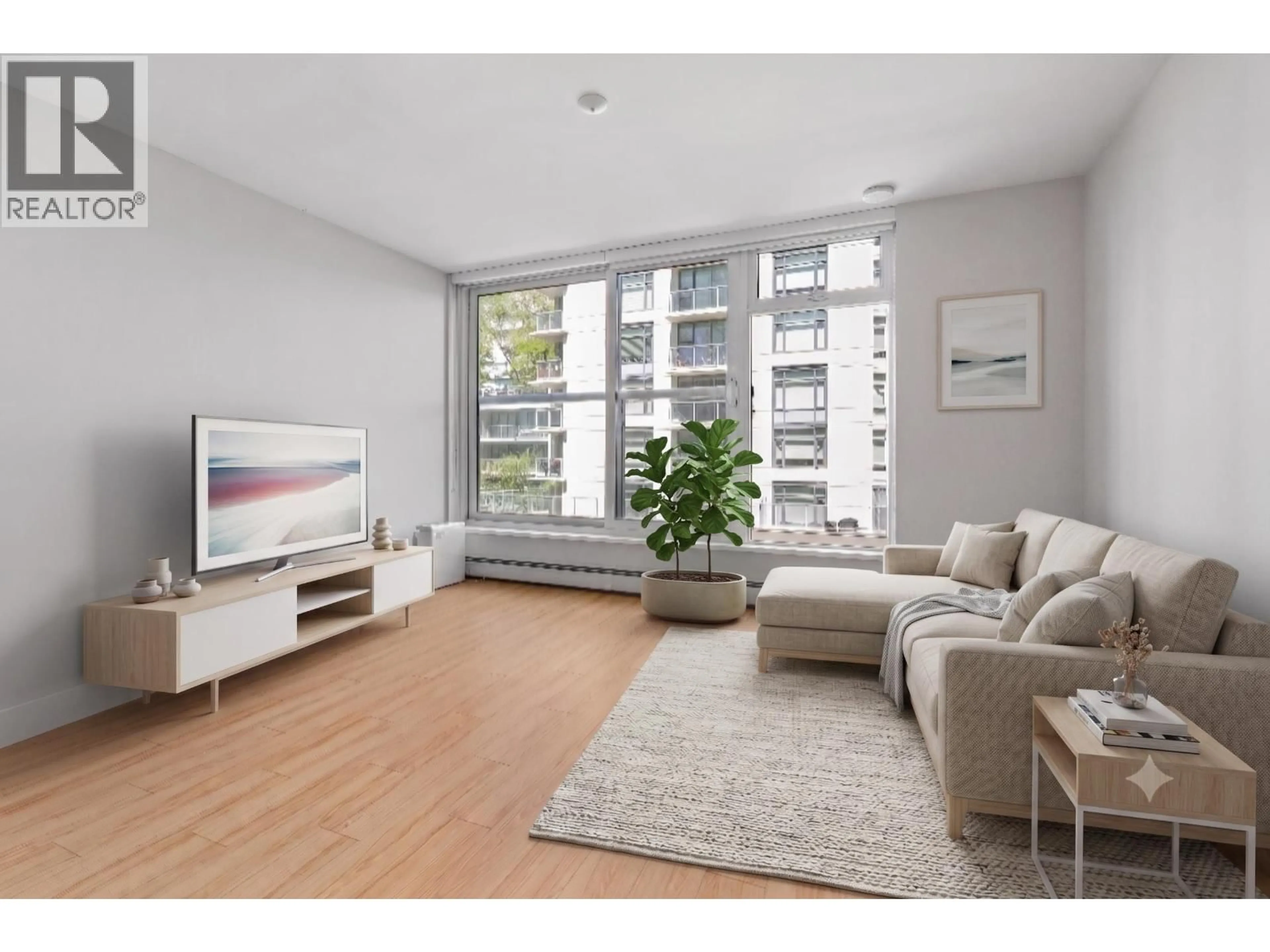 Living room with furniture, wood/laminate floor for 523 - 159 2ND AVENUE, Vancouver British Columbia V5Y0L8
