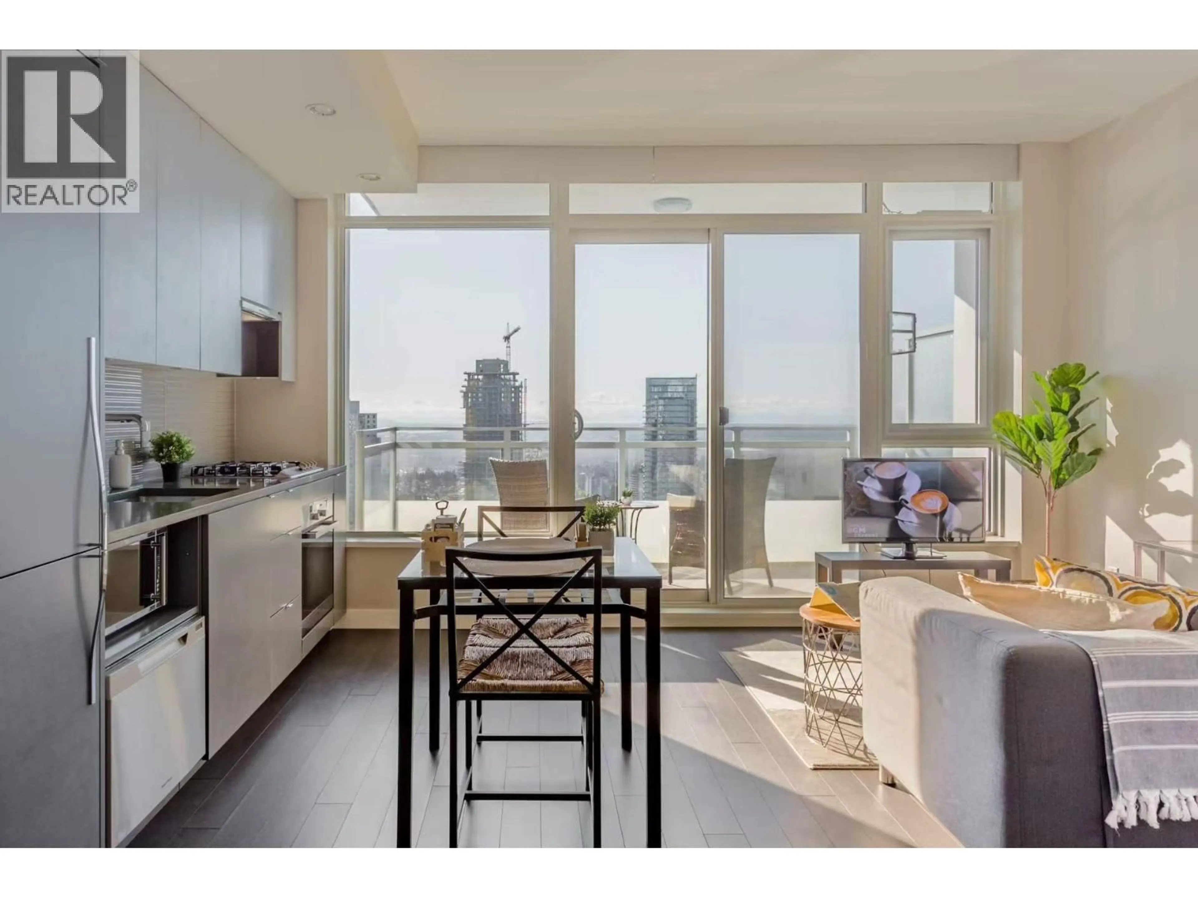 Open concept kitchen, wood/laminate floor for 3702 - 4508 HAZEL STREET, Burnaby British Columbia V5H0E4