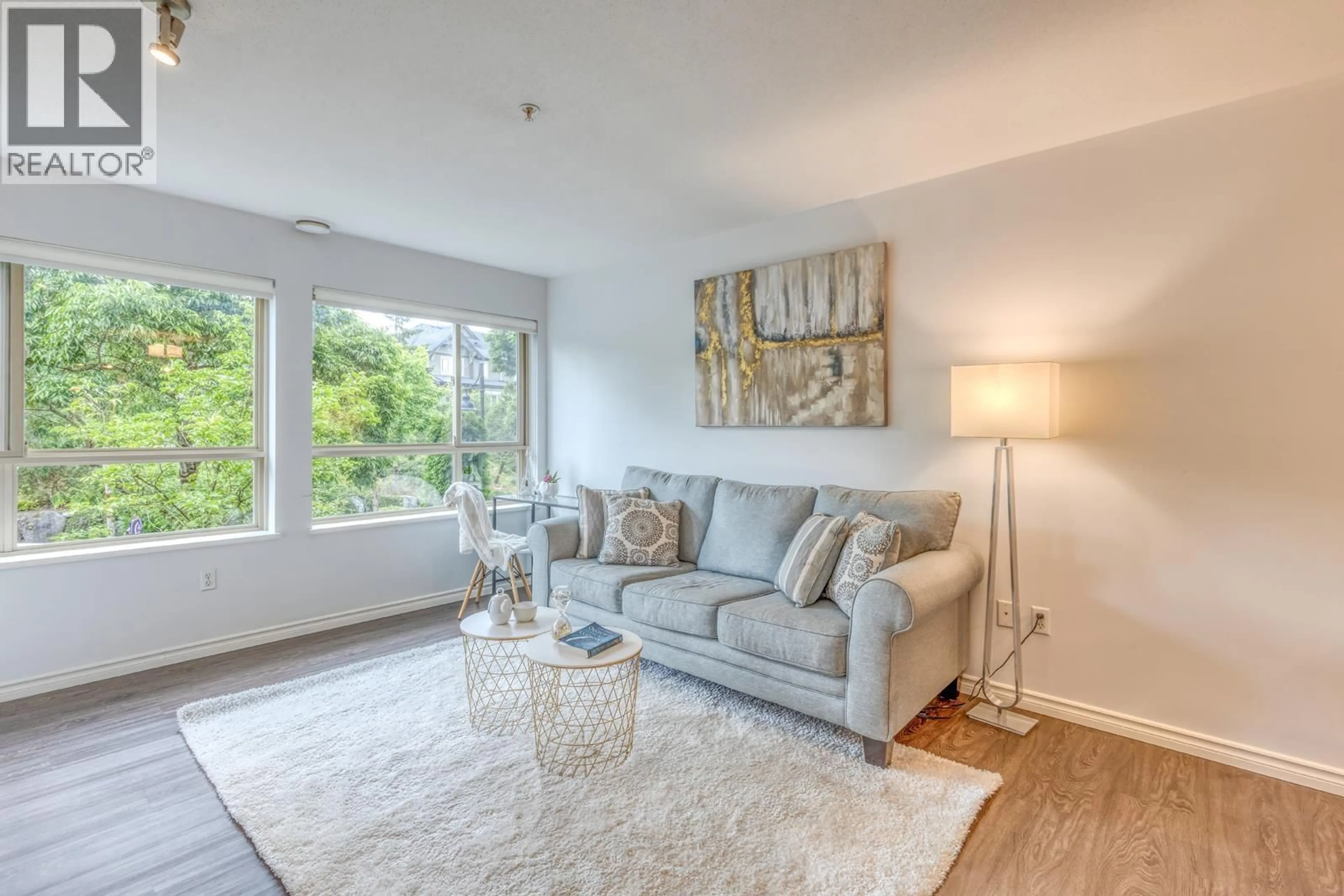 Living room with furniture, unknown for 316 - 3132 DAYANEE SPRINGS BOULEVARD, Coquitlam British Columbia V3E0B5