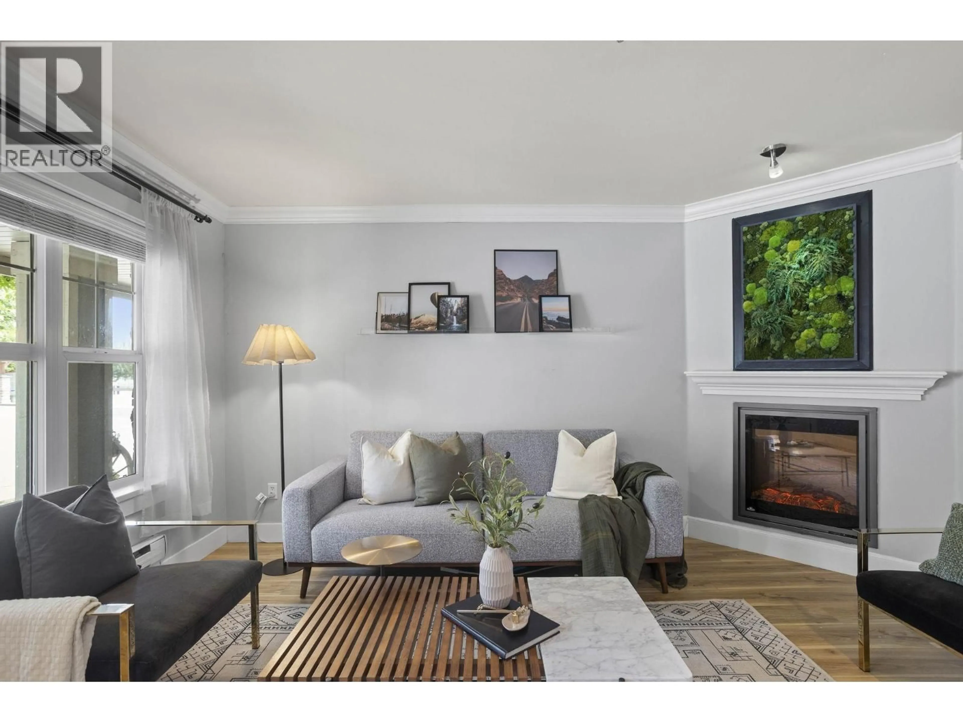 Living room with furniture, wood/laminate floor for 42 - 22977 116 AVENUE, Maple Ridge British Columbia V2X9A8