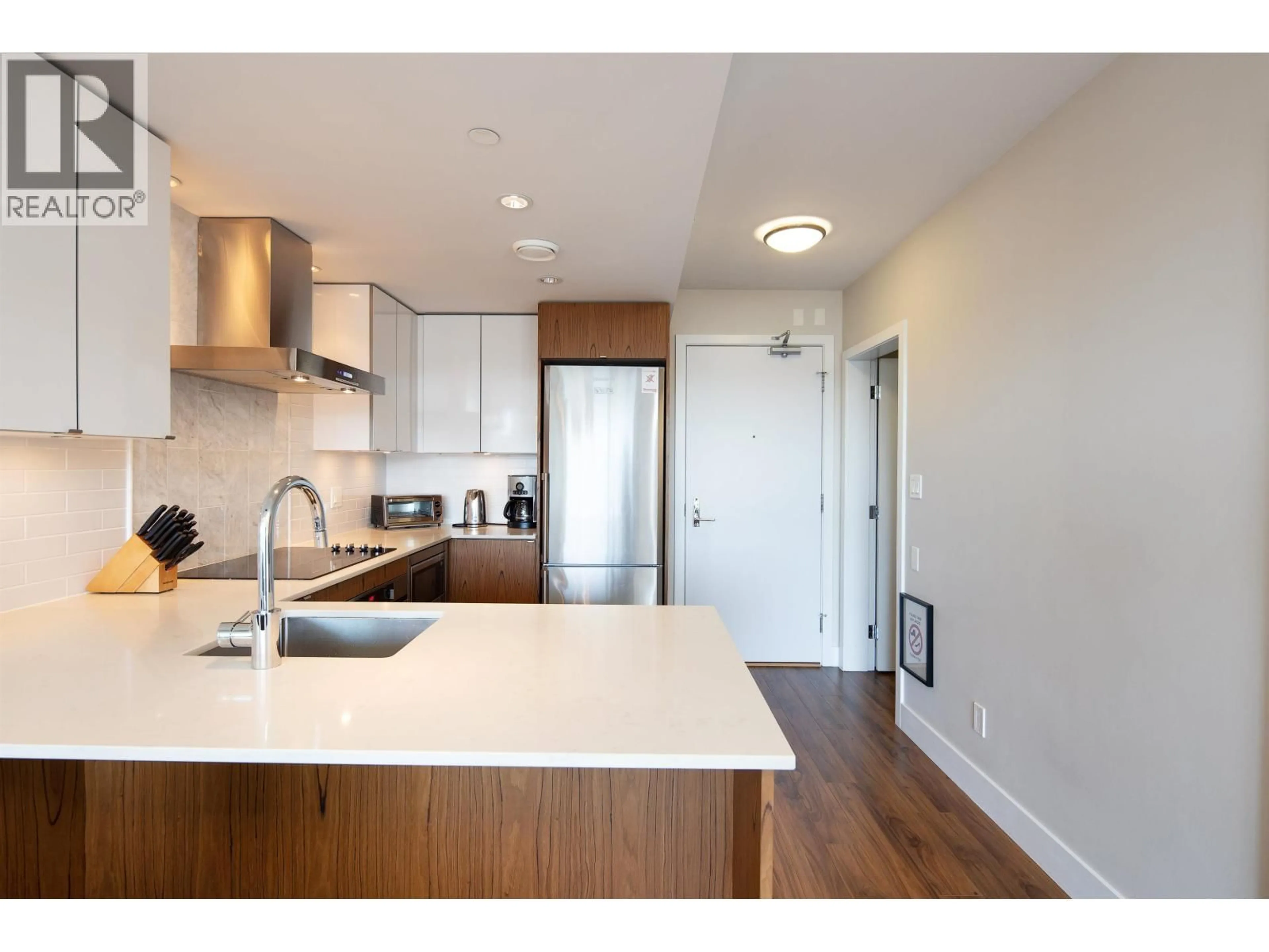 Open concept kitchen, wood/laminate floor for 312 - 159 2ND AVENUE, Vancouver British Columbia V5Y0L8