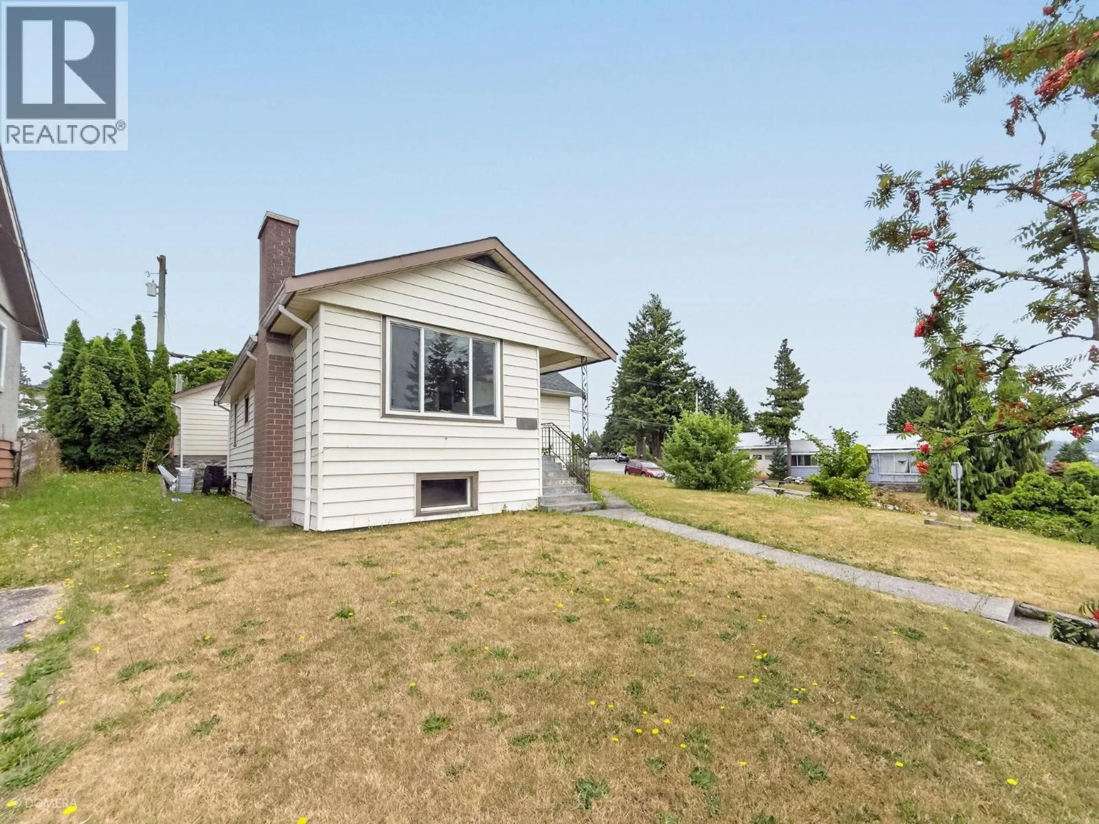 Home with vinyl exterior material, street for 319 EIGHTH AVENUE, New Westminster British Columbia V3L4K5