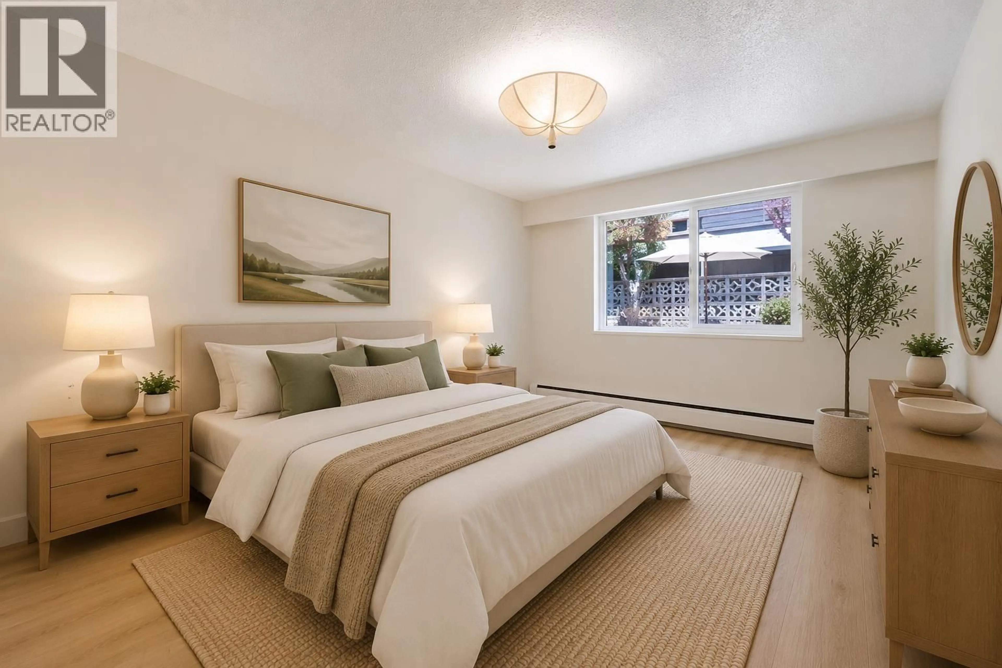 Bedroom with bed, carpet floor for 102 - 270 3RD STREET, North Vancouver British Columbia V7M1G1