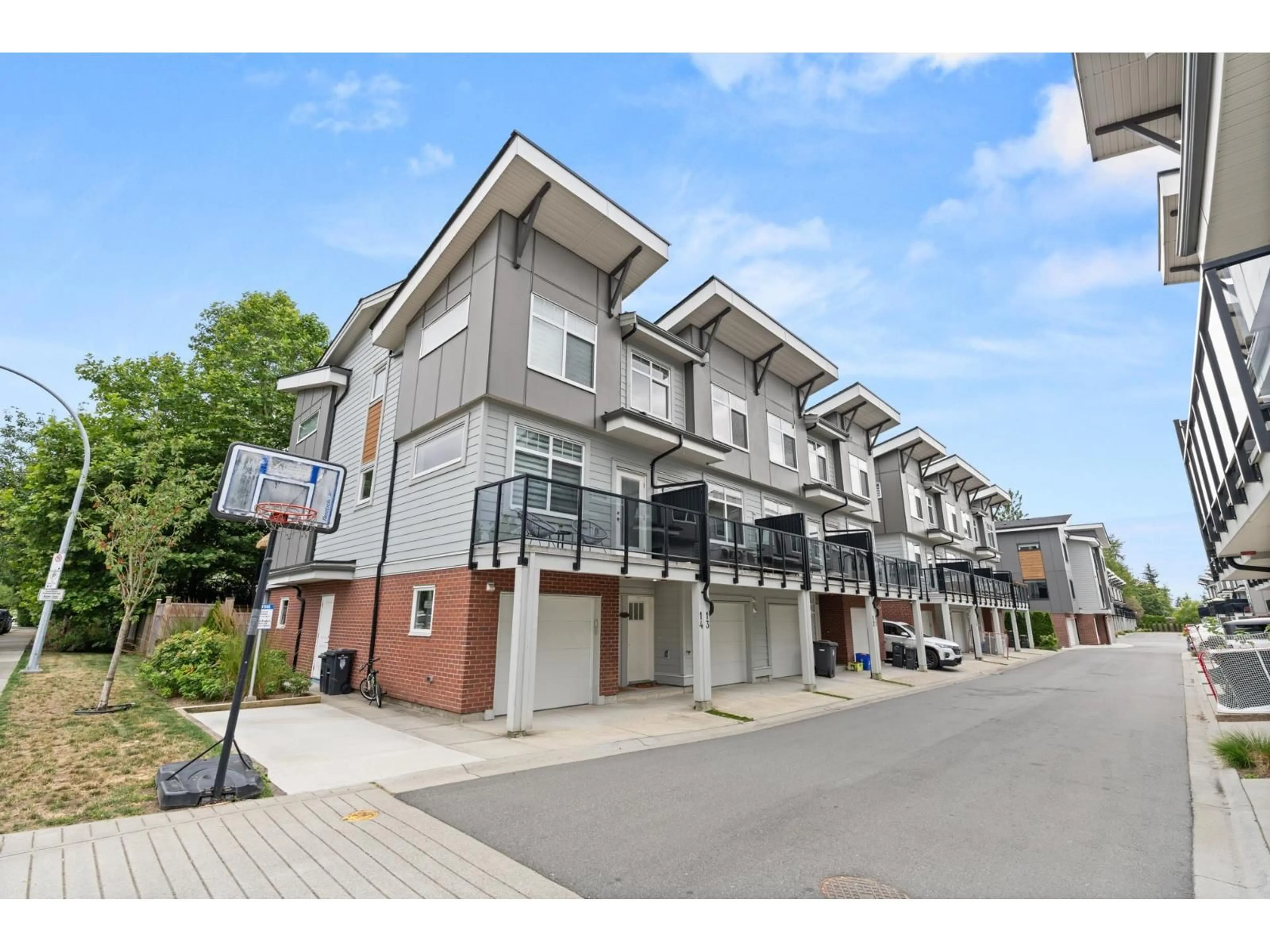 A pic from outside/outdoor area/front of a property/back of a property/a pic from drone, street for 13 - 4771 224 STREET, Langley British Columbia V3A3N5