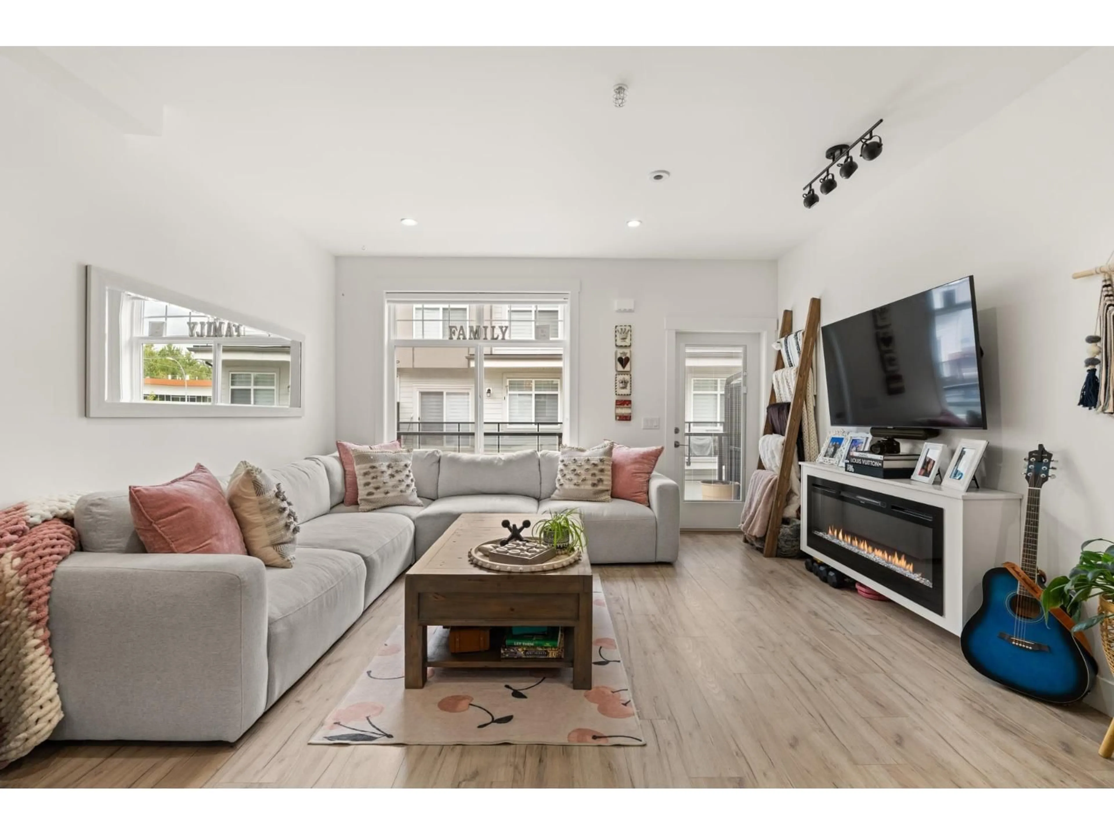 Living room with furniture, wood/laminate floor for 13 - 4771 224 STREET, Langley British Columbia V3A3N5
