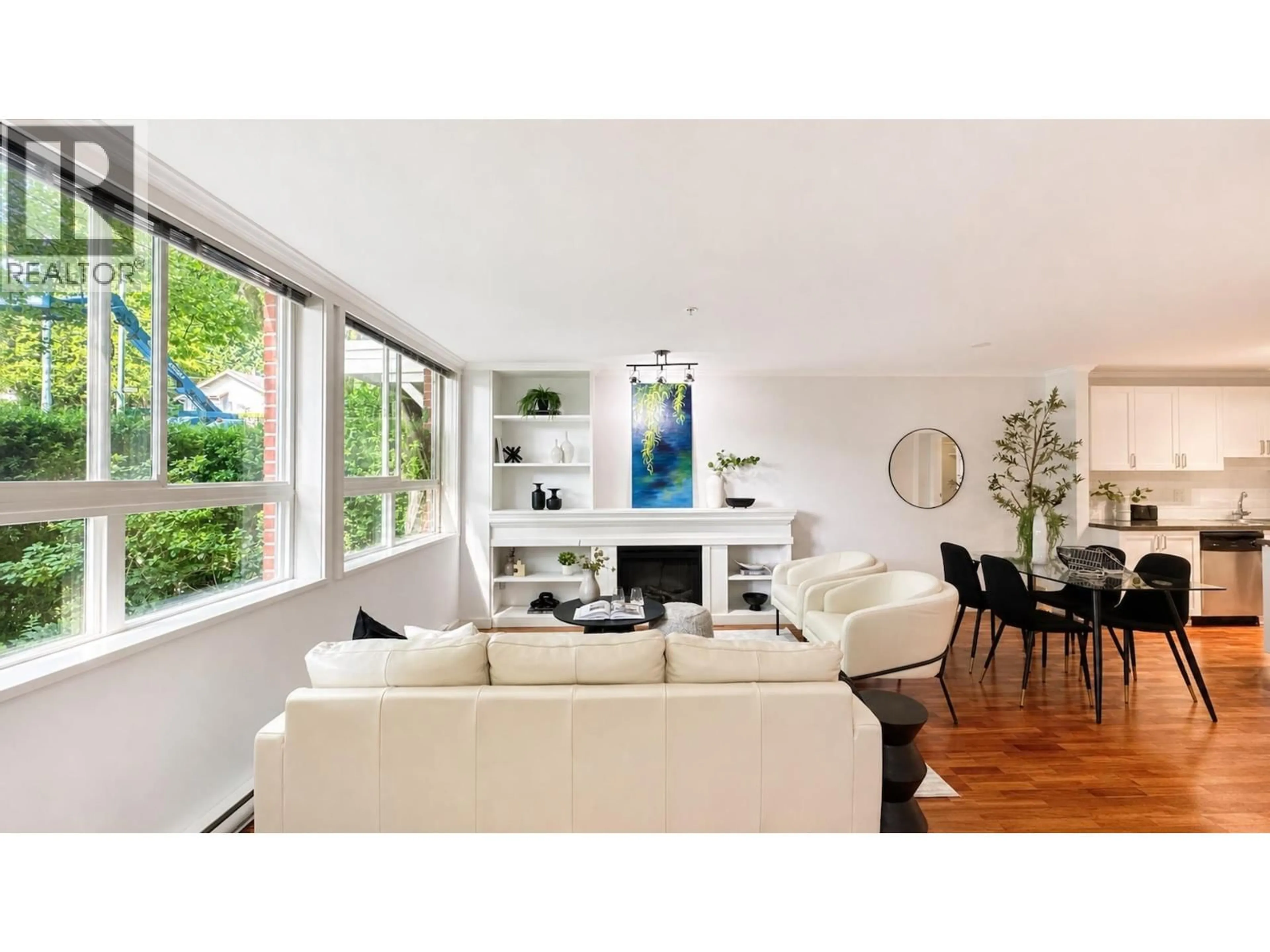 Living room with furniture, wood/laminate floor for 3681 12TH AVENUE, Vancouver British Columbia V6R2N5