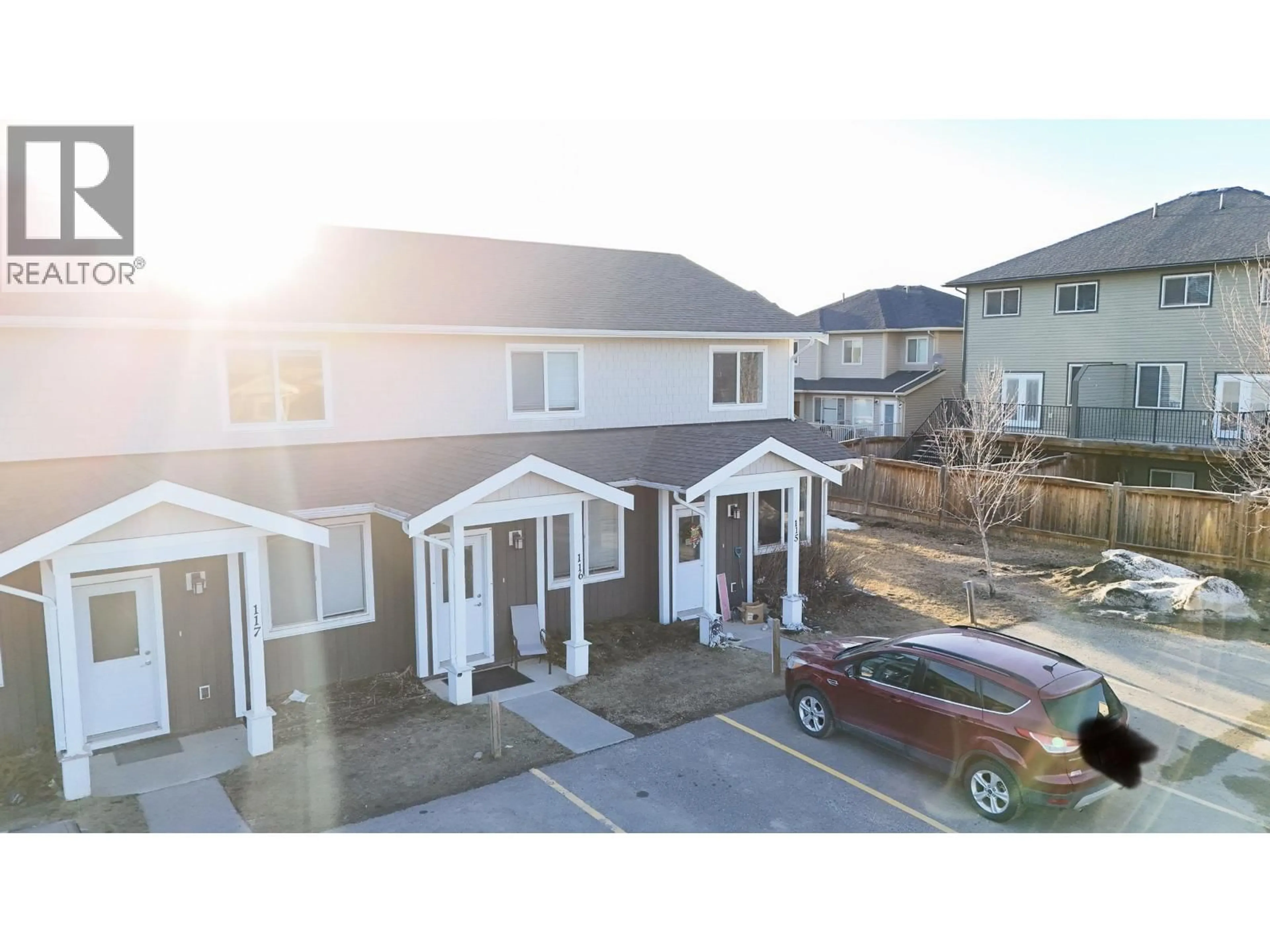 A pic from outside/outdoor area/front of a property/back of a property/a pic from drone, street for 115 - 11008 102 AVENUE, Fort St. John British Columbia V1J0L9