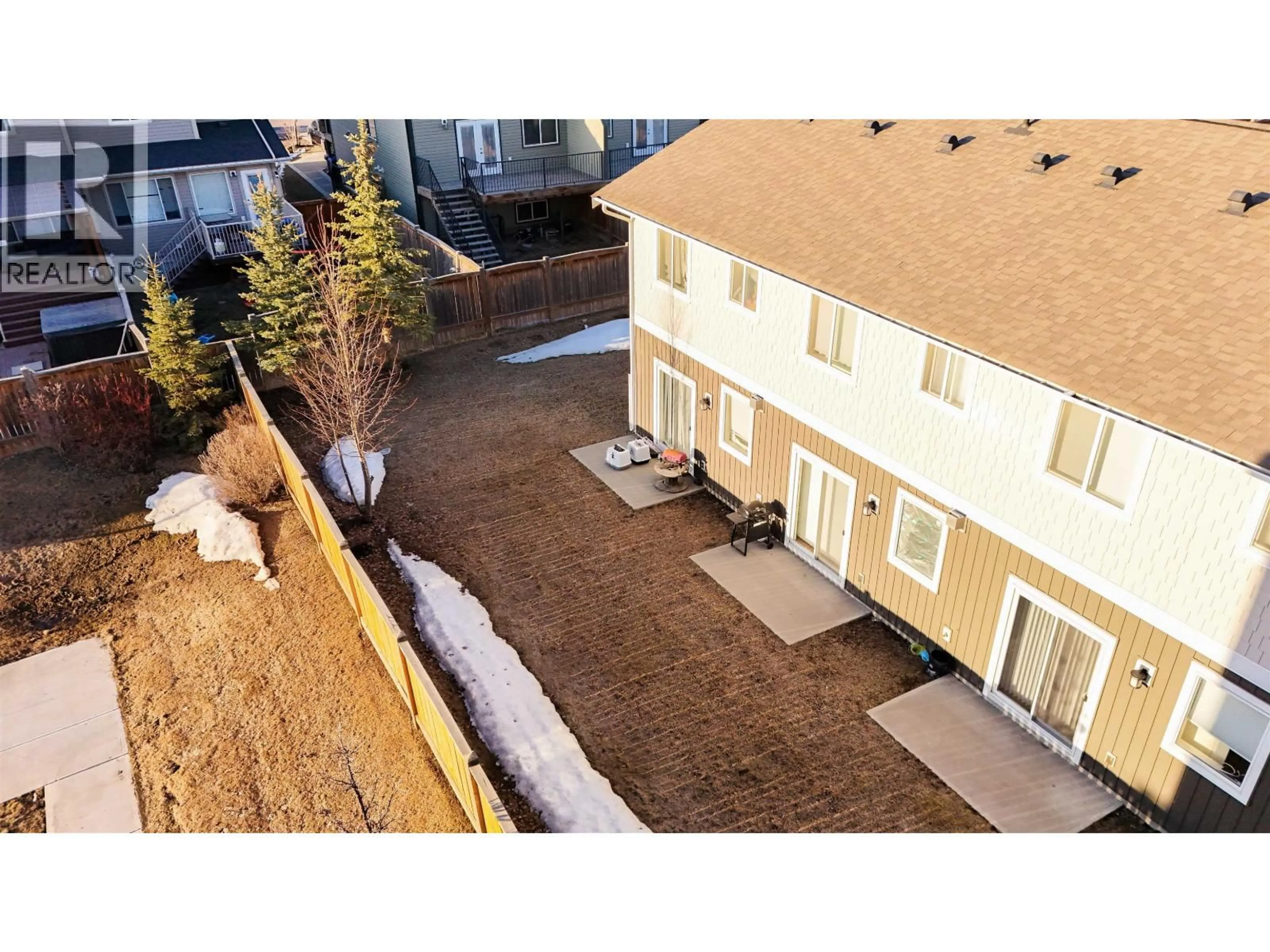 A pic from outside/outdoor area/front of a property/back of a property/a pic from drone, street for 115 - 11008 102 AVENUE, Fort St. John British Columbia V1J0L9