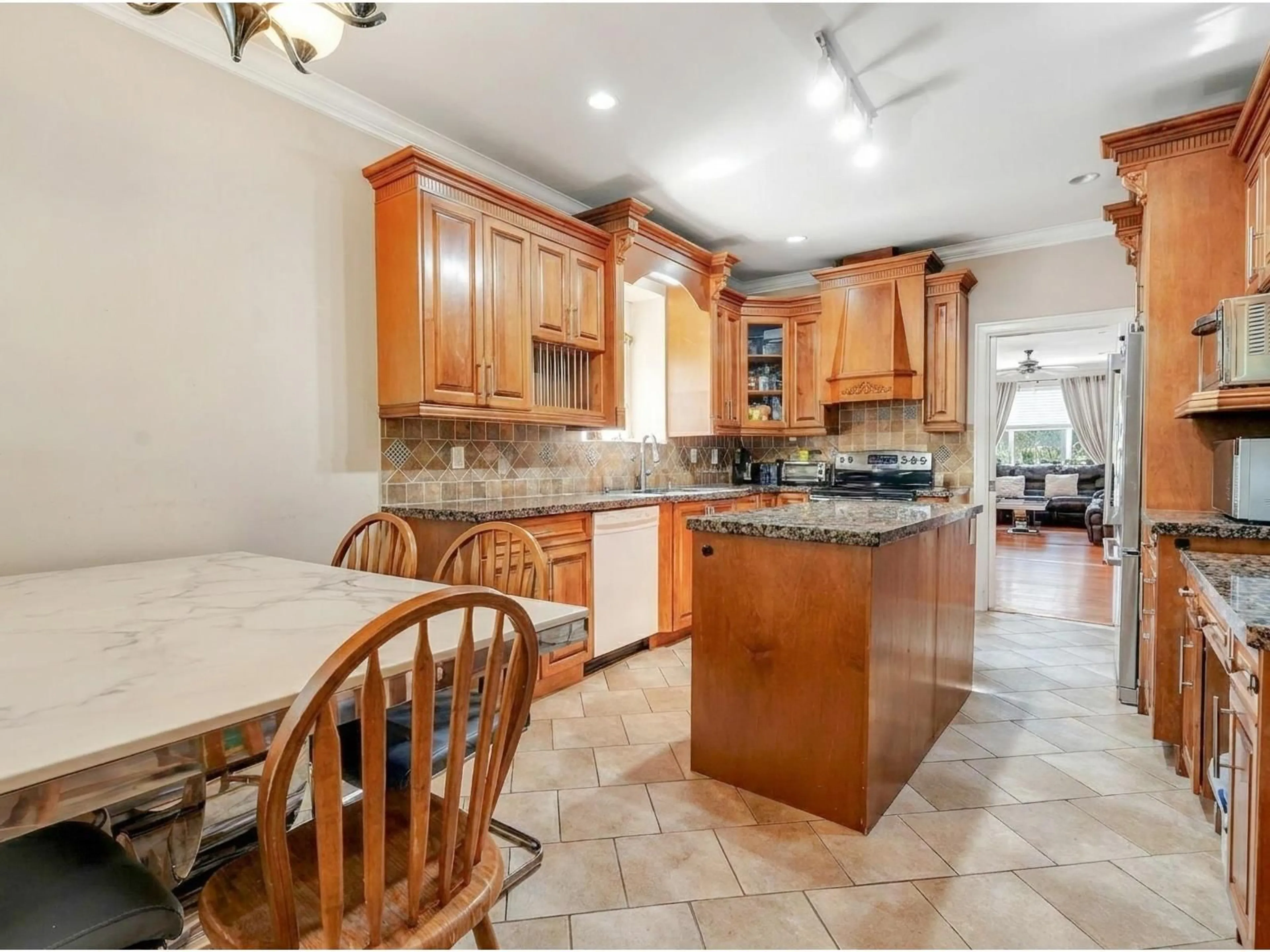 Open concept kitchen, ceramic/tile floor for 14065 100 AVENUE, Surrey British Columbia V3T1J7