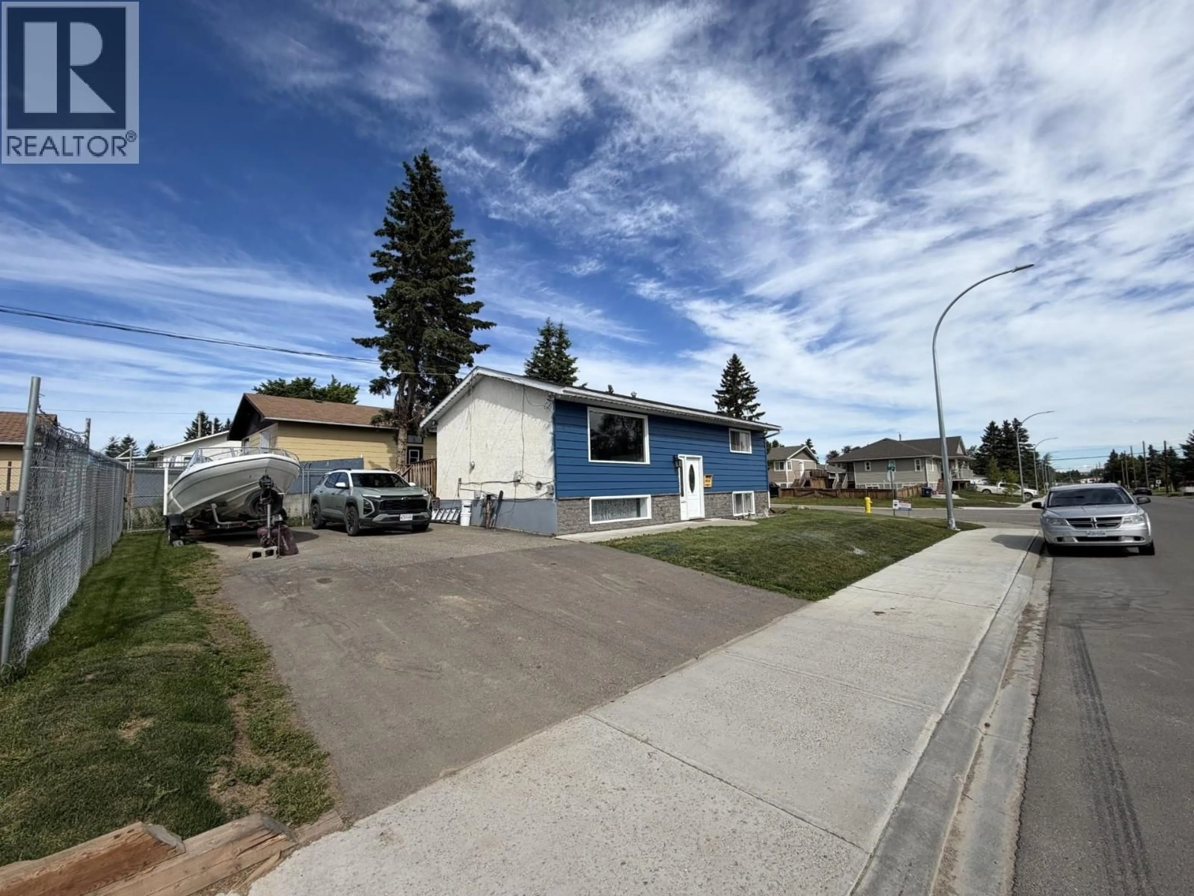 A pic from outside/outdoor area/front of a property/back of a property/a pic from drone, street for 9616 84 STREET, Fort St. John British Columbia V1J3E7