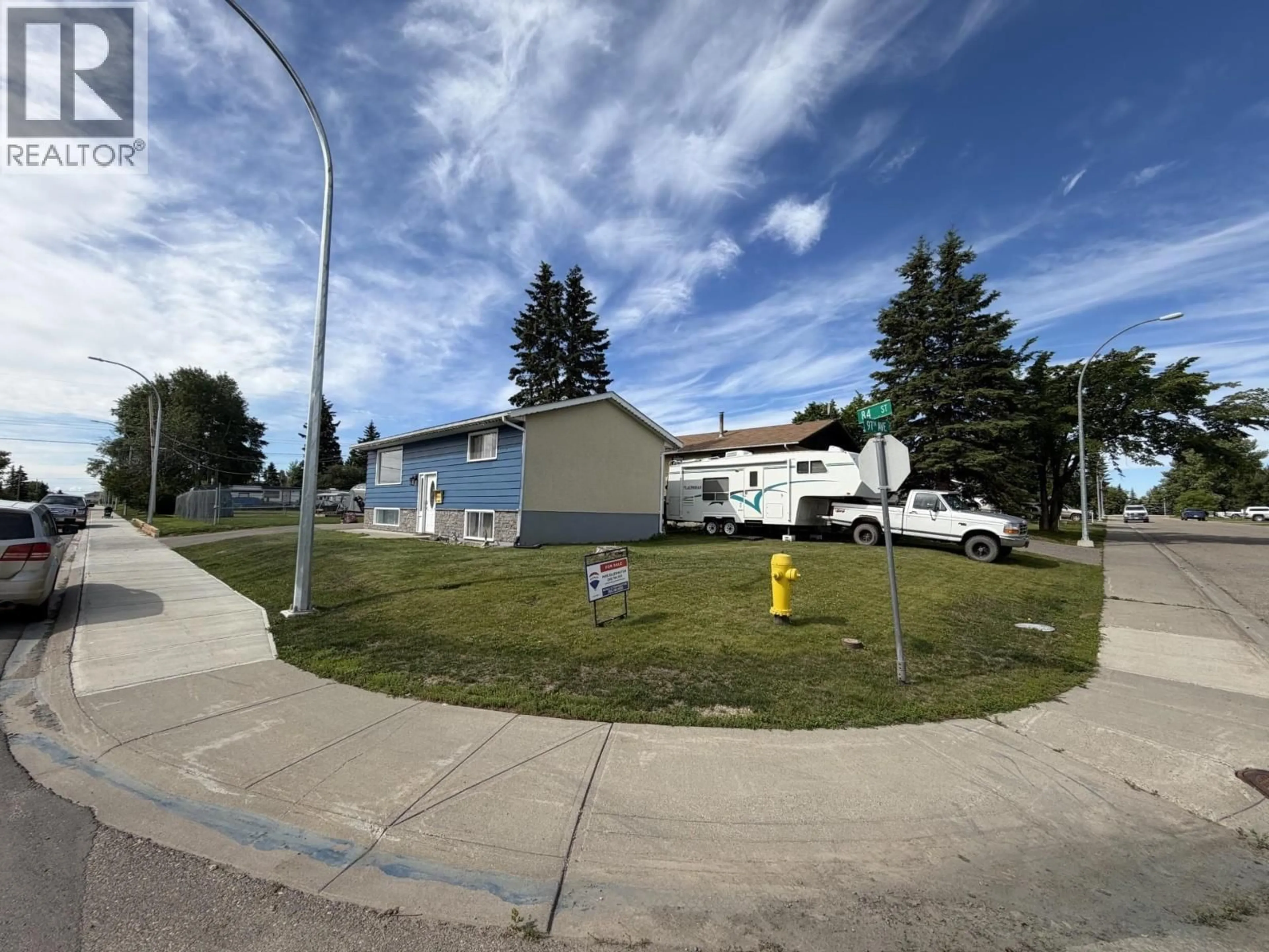 A pic from outside/outdoor area/front of a property/back of a property/a pic from drone, street for 9616 84 STREET, Fort St. John British Columbia V1J3E7