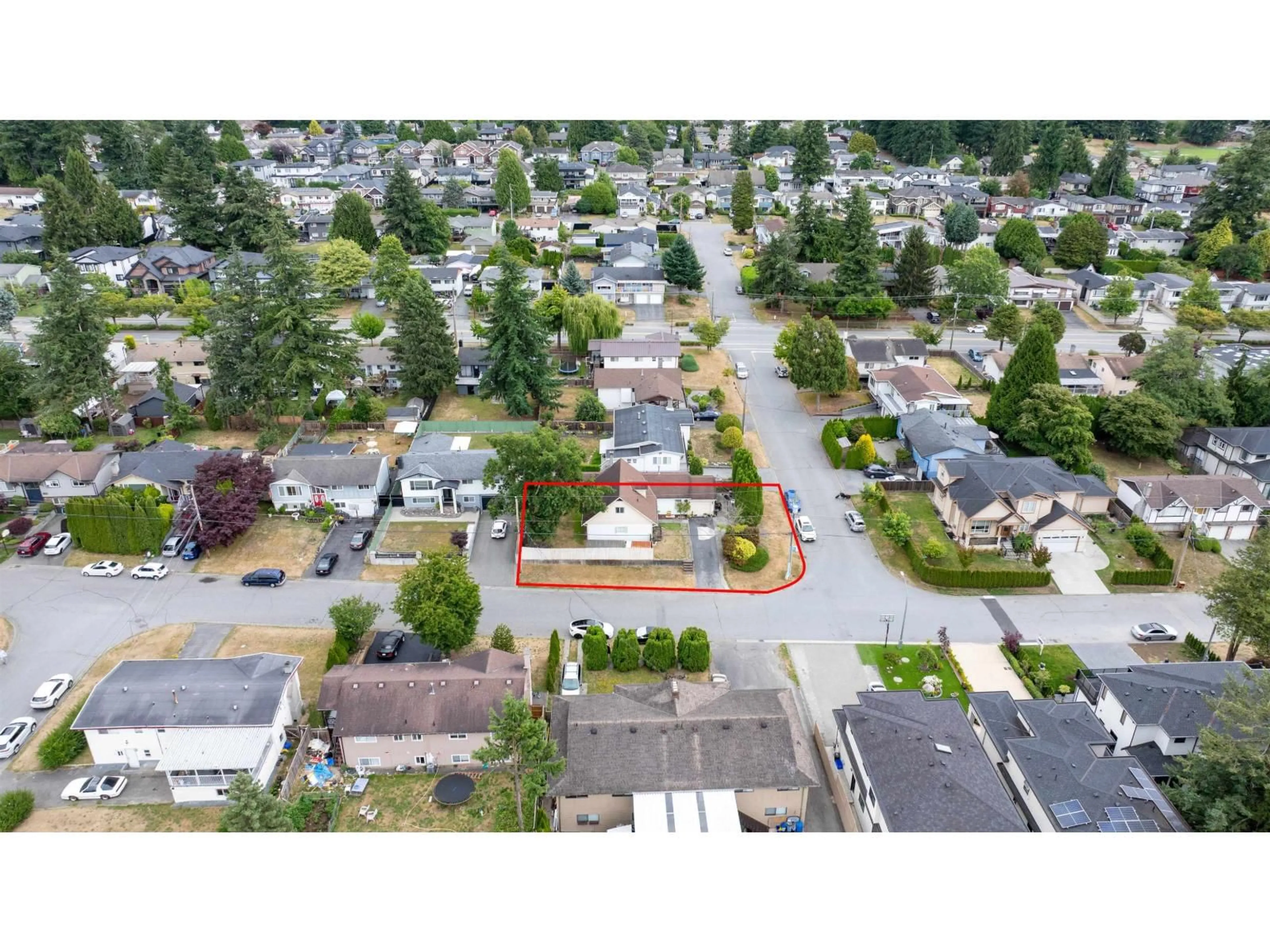A pic from outside/outdoor area/front of a property/back of a property/a pic from drone, street for 11565 77A AVENUE, Delta British Columbia V4C1M6