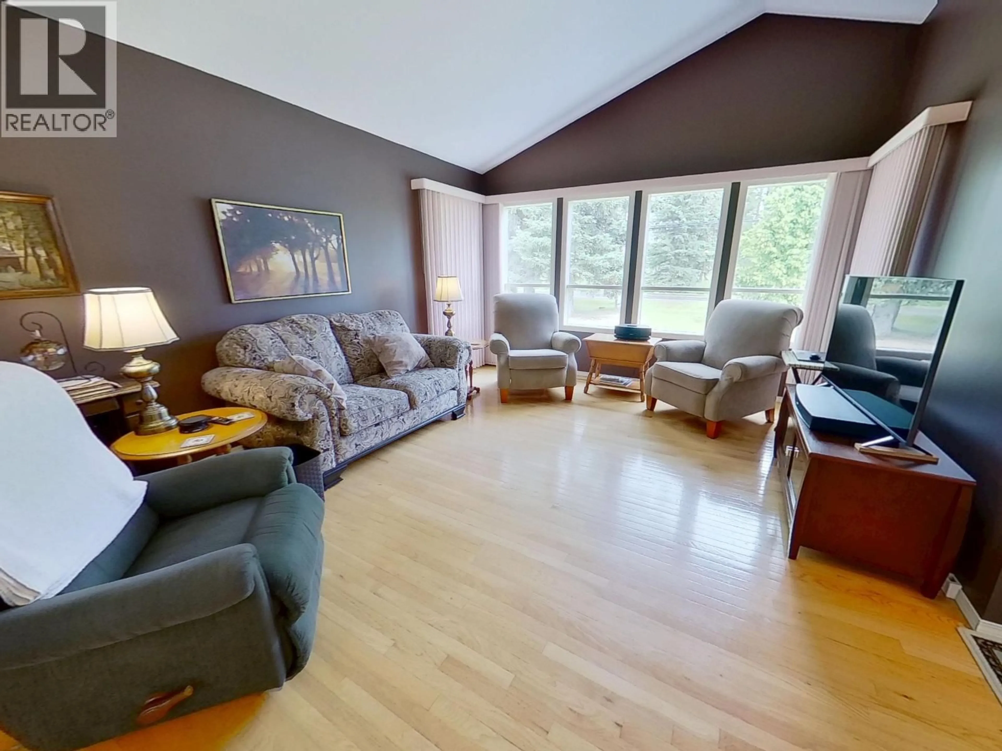 Living room with furniture, wood/laminate floor for 163 WESTLAND ROAD, Quesnel British Columbia V2J4E7