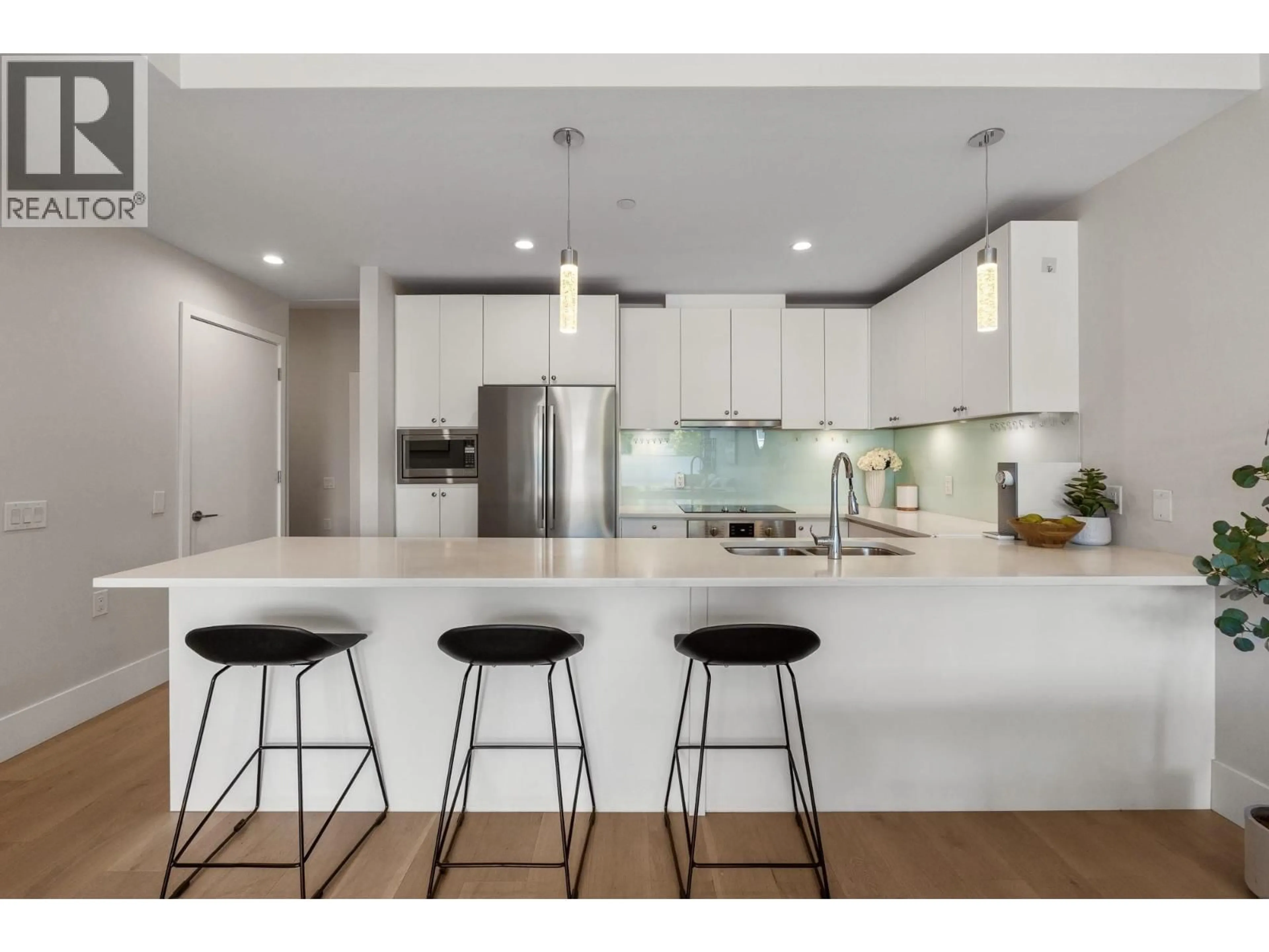 Open concept kitchen, unknown for 206 - 1591 BOWSER AVENUE, North Vancouver British Columbia V7P2Y4