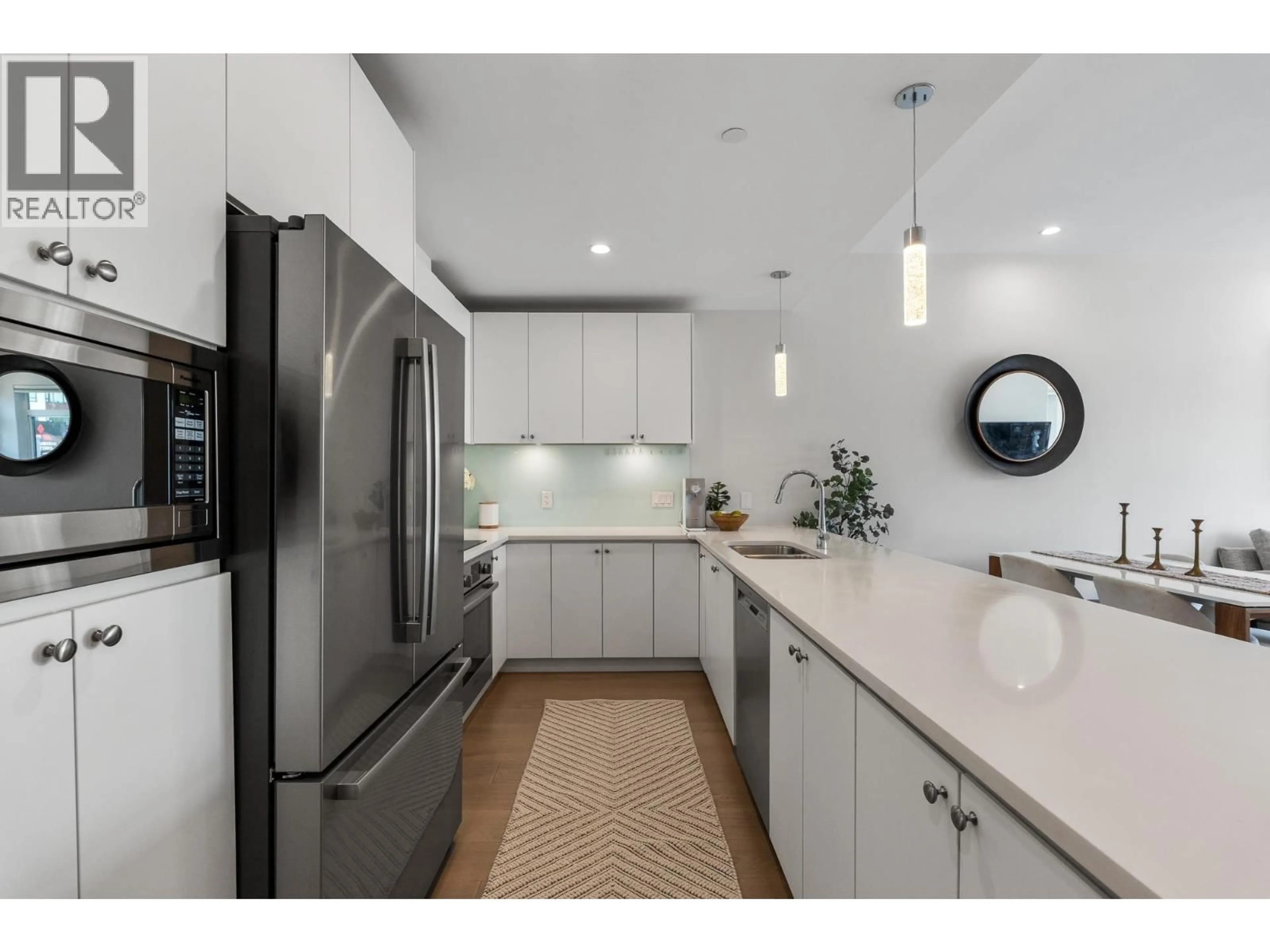 Contemporary kitchen, ceramic/tile floor for 206 - 1591 BOWSER AVENUE, North Vancouver British Columbia V7P2Y4