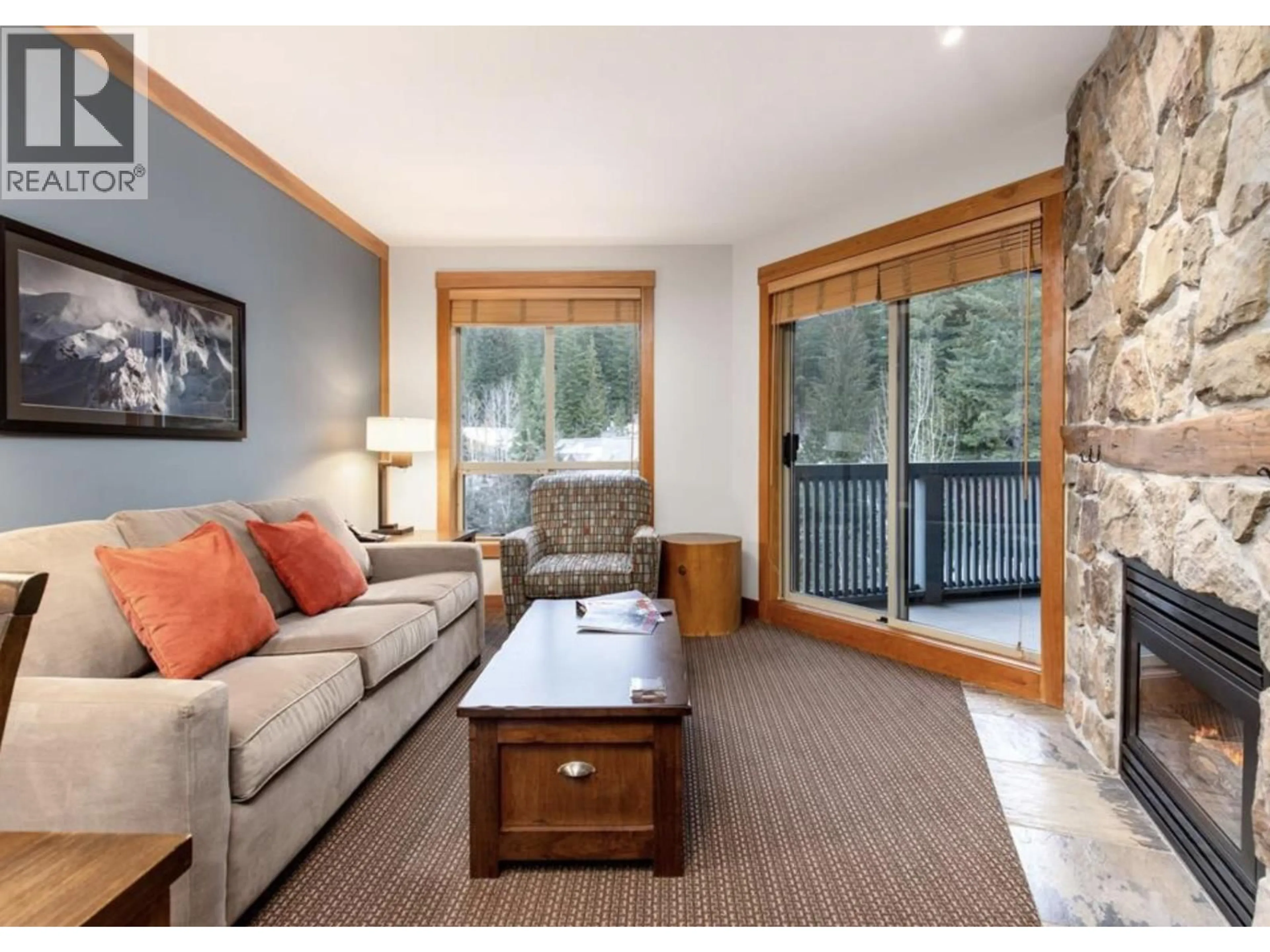 Living room with furniture, wood/laminate floor for 220D - 2036 LONDON LANE, Whistler British Columbia V8E0N7