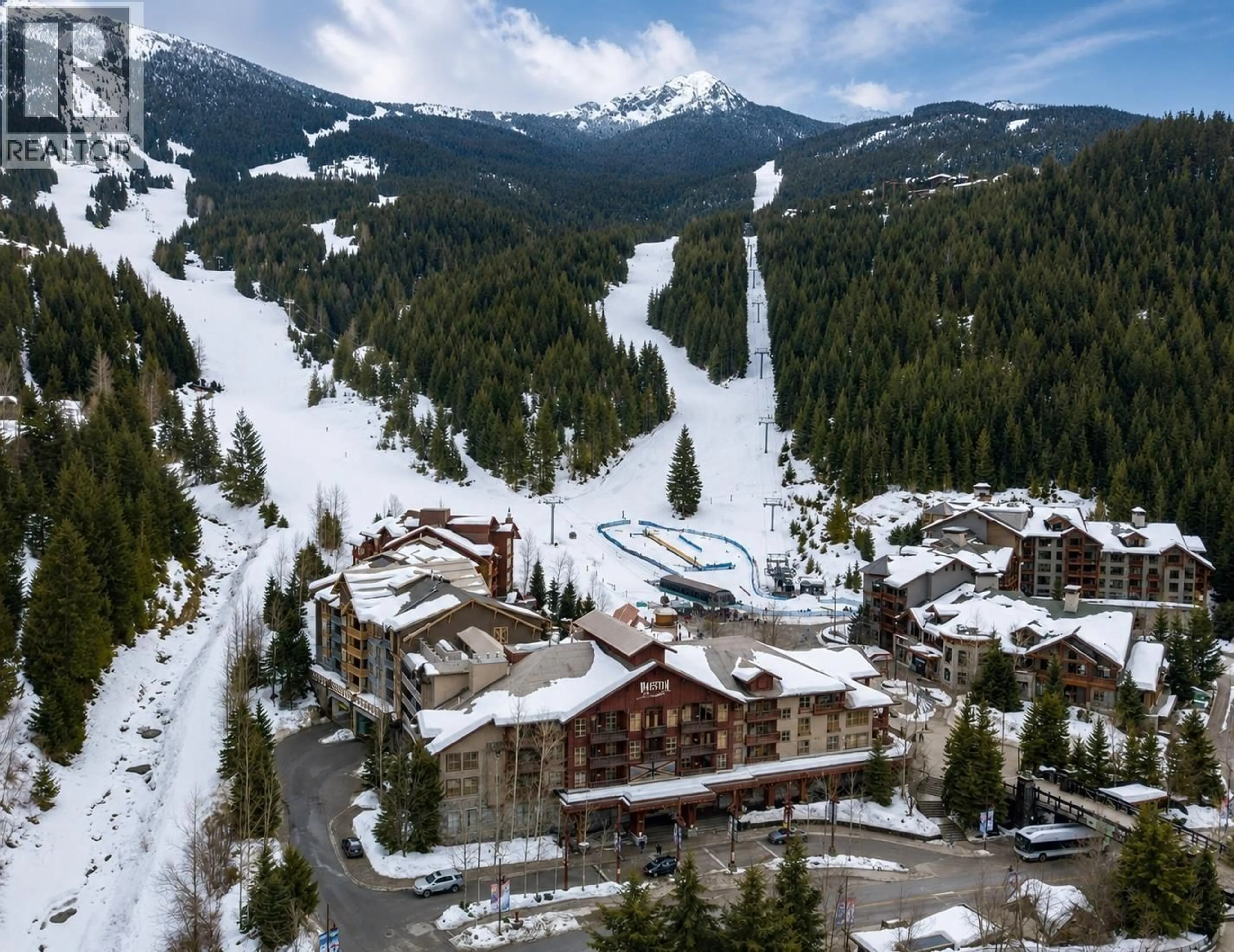 A pic from outside/outdoor area/front of a property/back of a property/a pic from drone, mountain view for 220D - 2036 LONDON LANE, Whistler British Columbia V8E0N7
