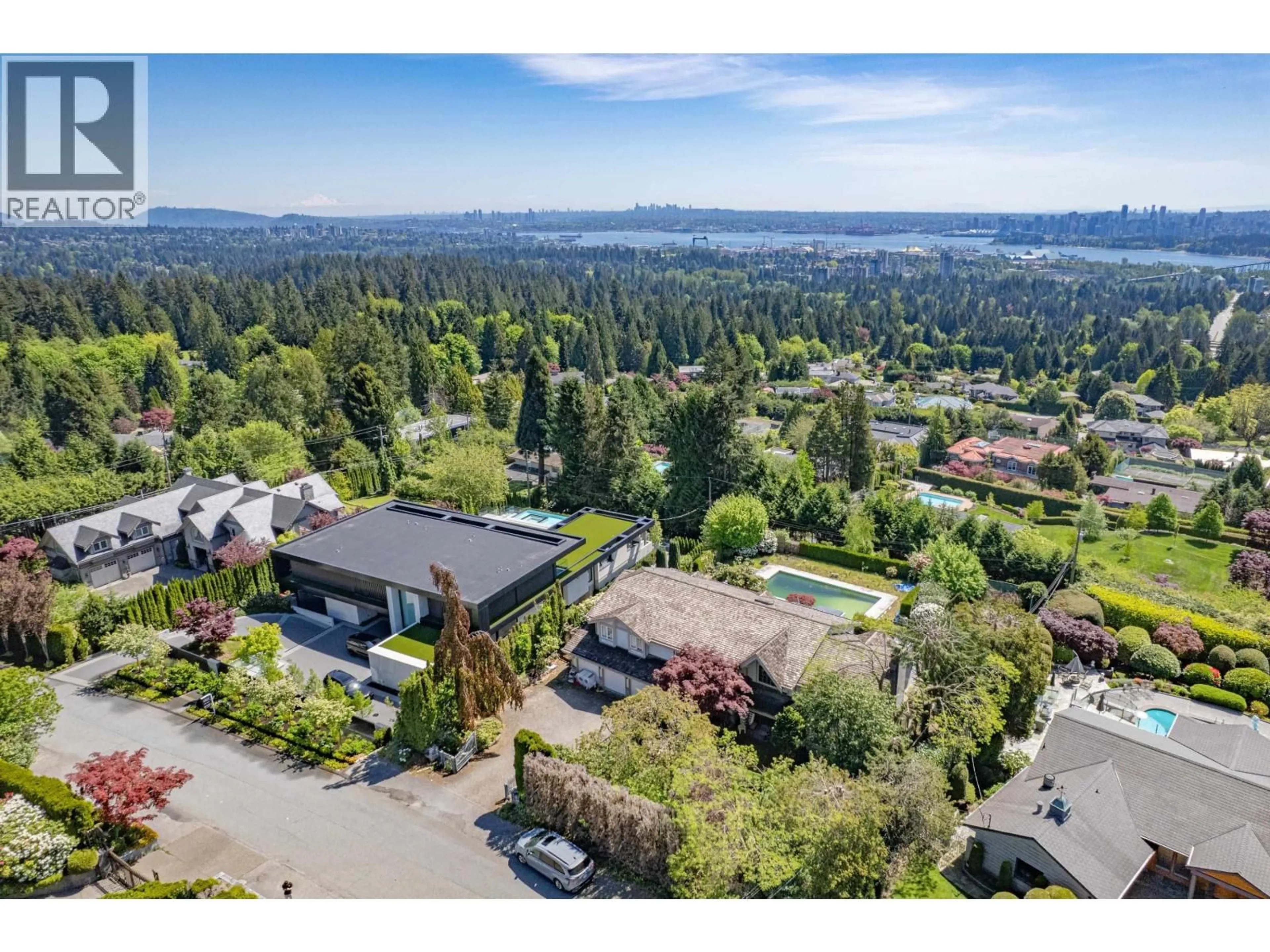 A pic from outside/outdoor area/front of a property/back of a property/a pic from drone, mountain view for 740 KNOCKMAROON ROAD, West Vancouver British Columbia V7S1R6