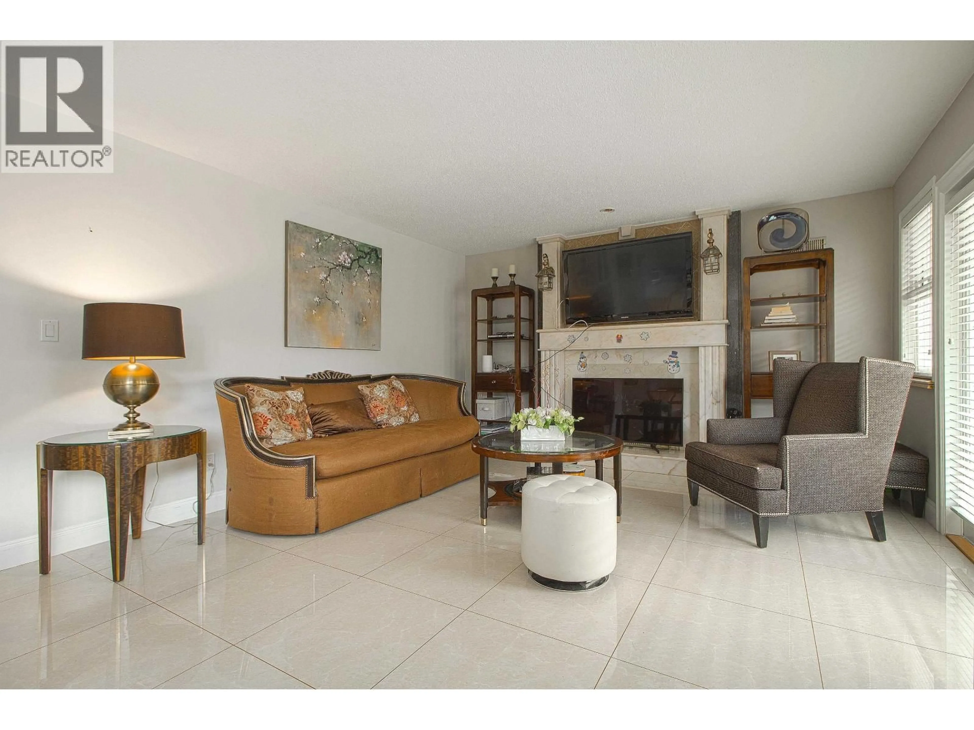 Living room with furniture, ceramic/tile floor for 5720 EASTMAN DRIVE, Richmond British Columbia V7E6H2