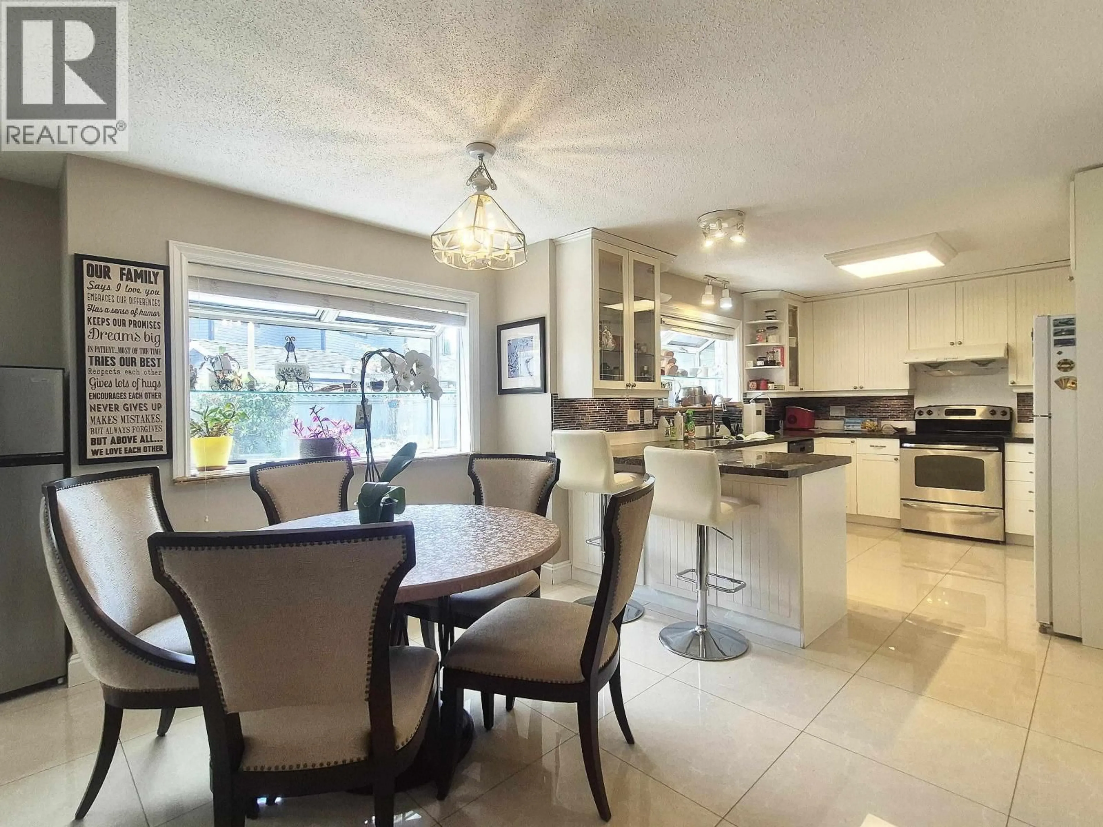 Open concept kitchen, ceramic/tile floor for 5720 EASTMAN DRIVE, Richmond British Columbia V7E6H2