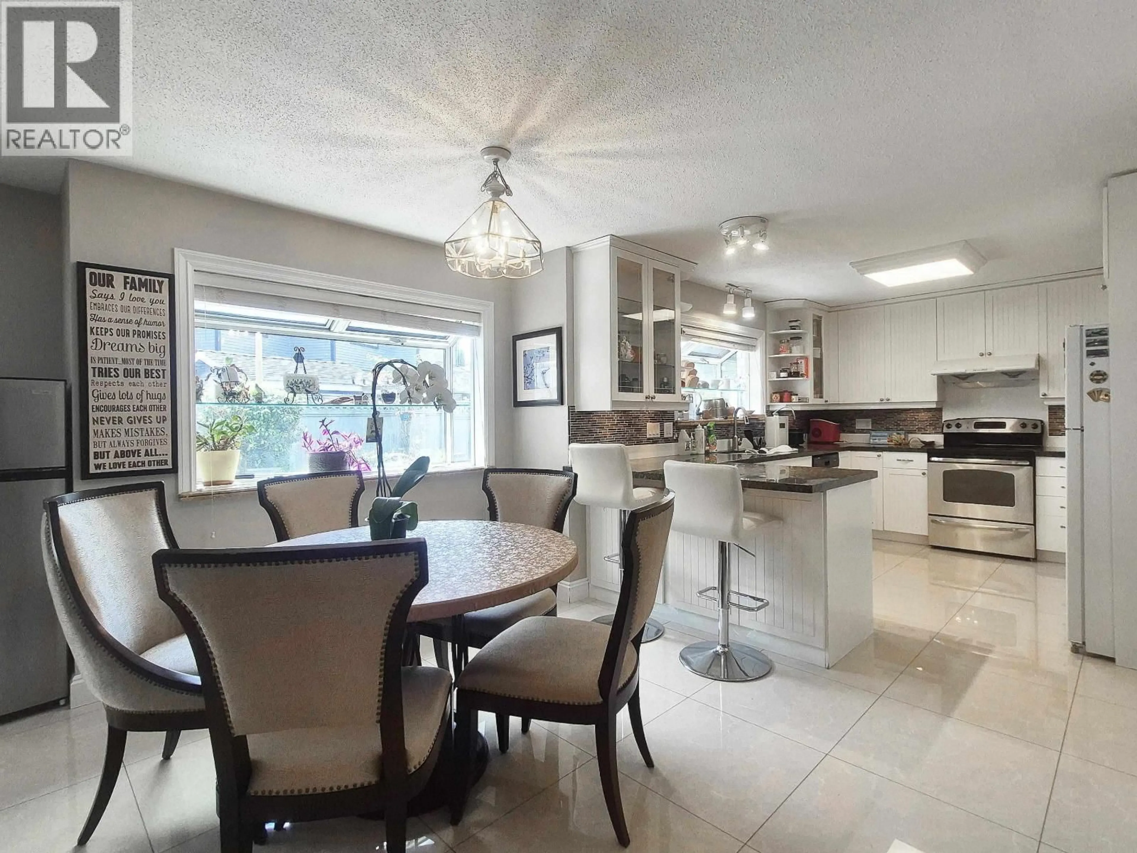 Open concept kitchen, ceramic/tile floor for 5720 EASTMAN DRIVE, Richmond British Columbia V7E6H2