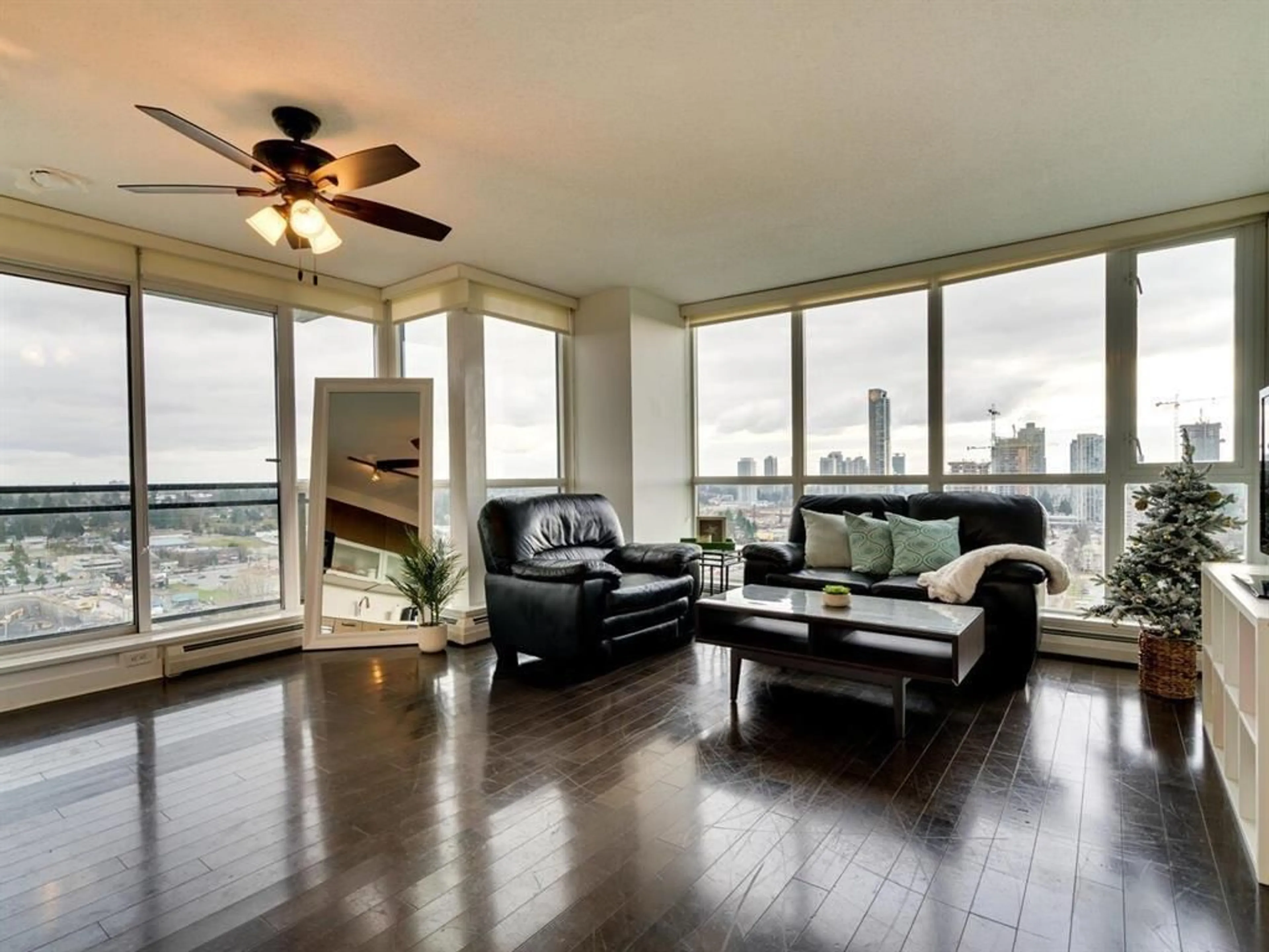 Living room with furniture, wood/laminate floor for 2302 - 10777 UNIVERSITY DRIVE, Surrey British Columbia V3T0E6