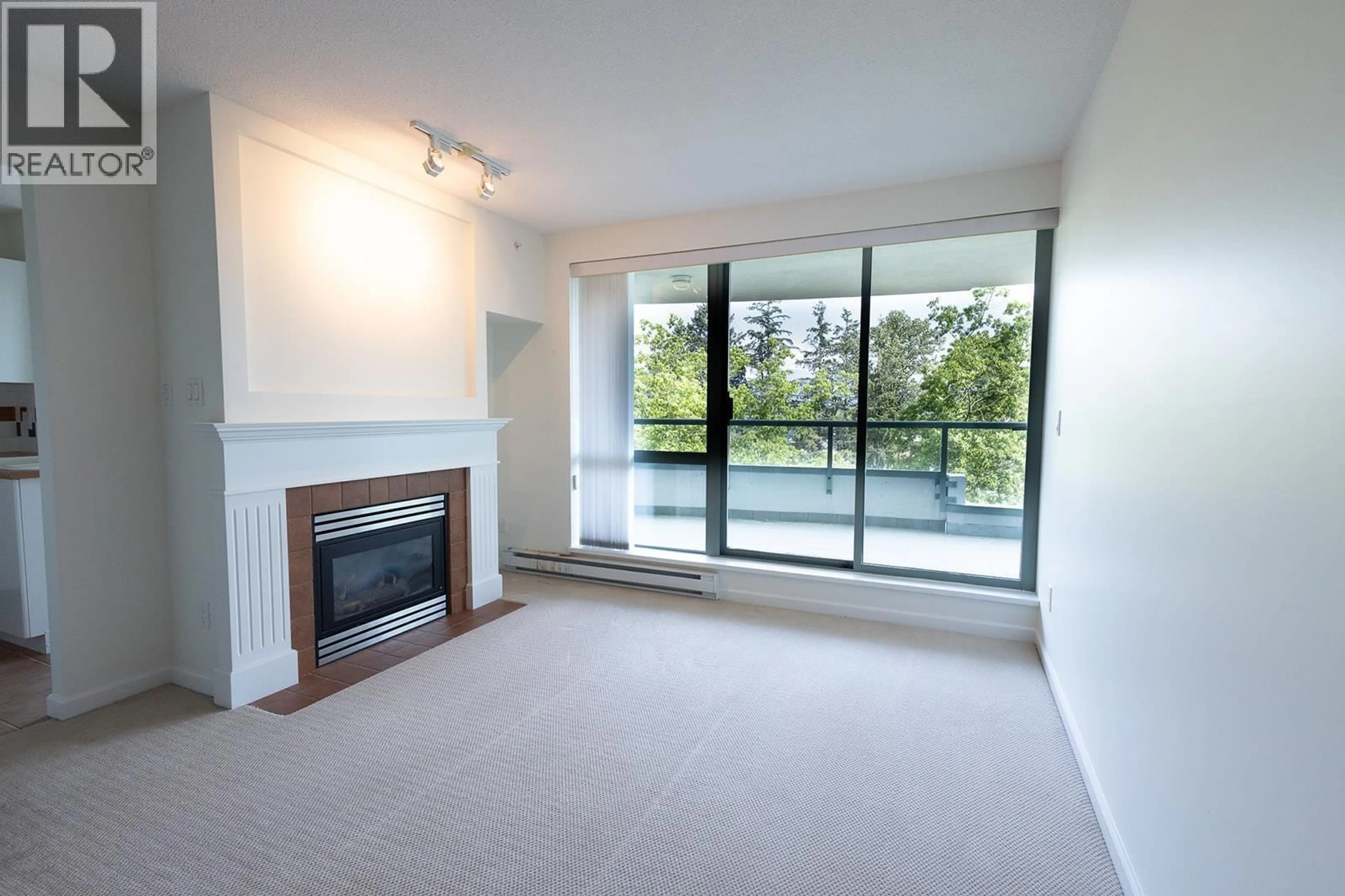 Living room with furniture, unknown for 807 - 6611 SOUTHOAKS CRESCENT, Burnaby British Columbia V5E4L5