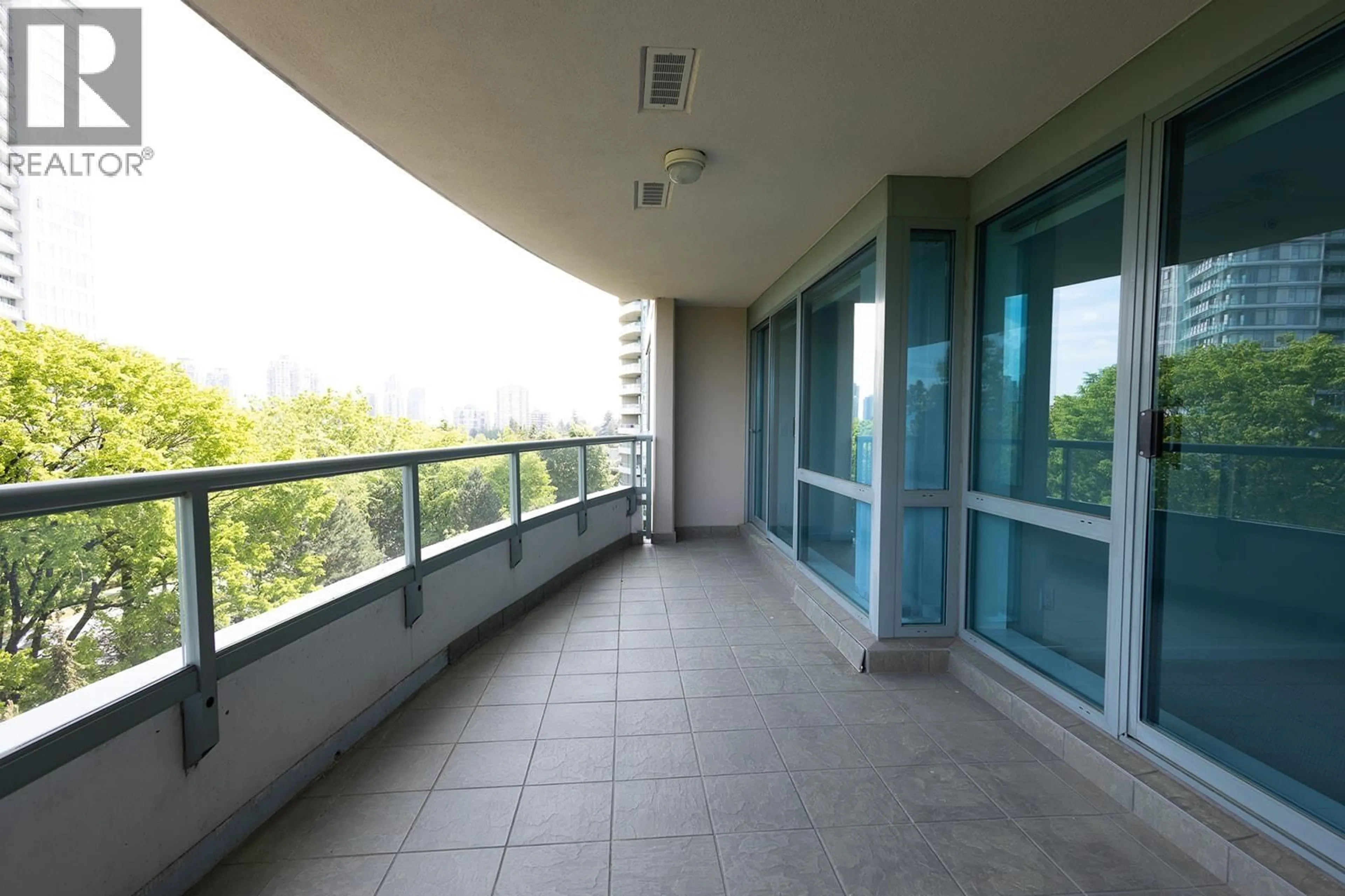 Balcony in the apartment, city buildings view from balcony for 807 - 6611 SOUTHOAKS CRESCENT, Burnaby British Columbia V5E4L5