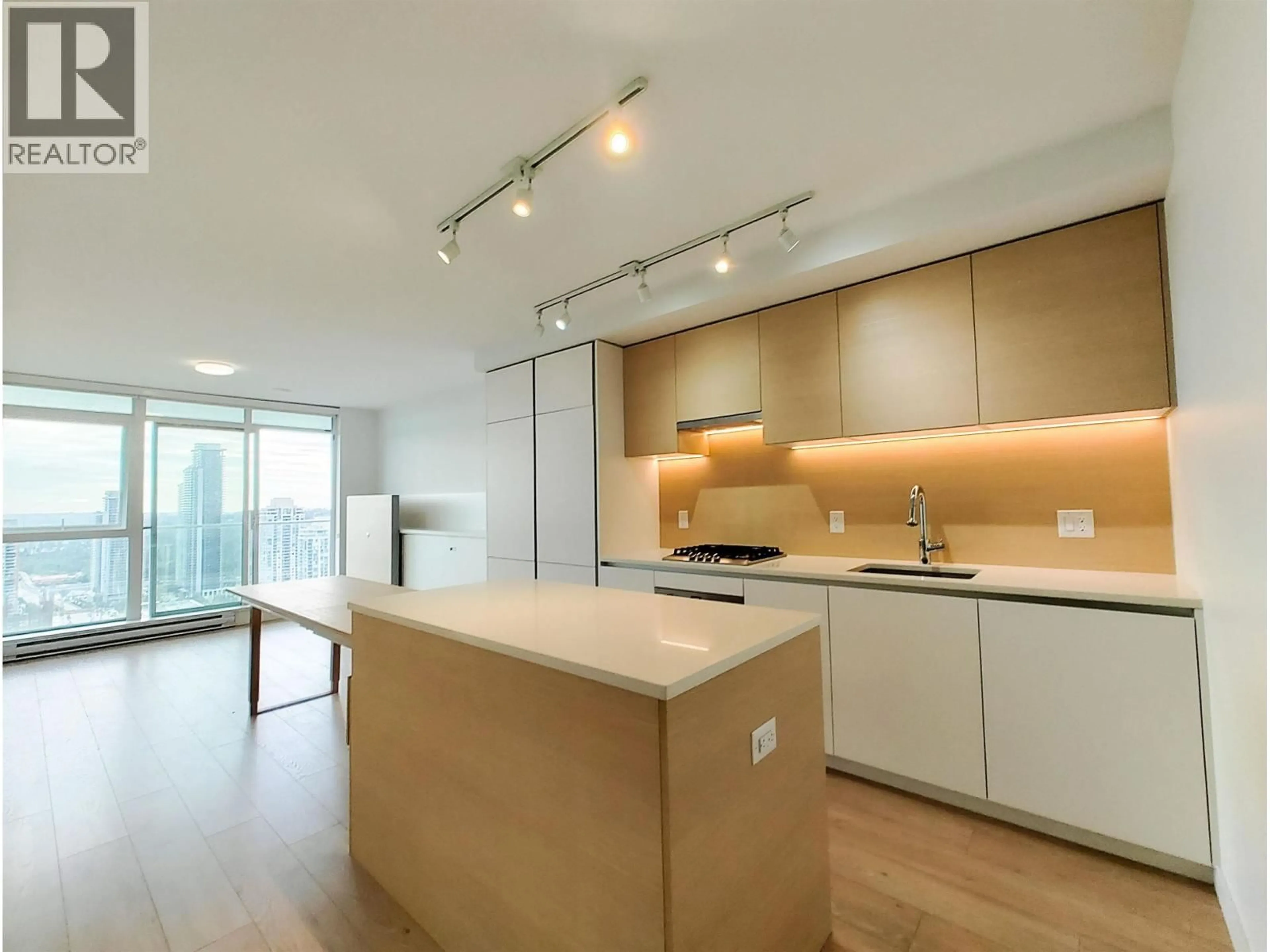 Open concept kitchen, wood/laminate floor for 2503 - 652 WHITING WAY, Coquitlam British Columbia V3J0K3