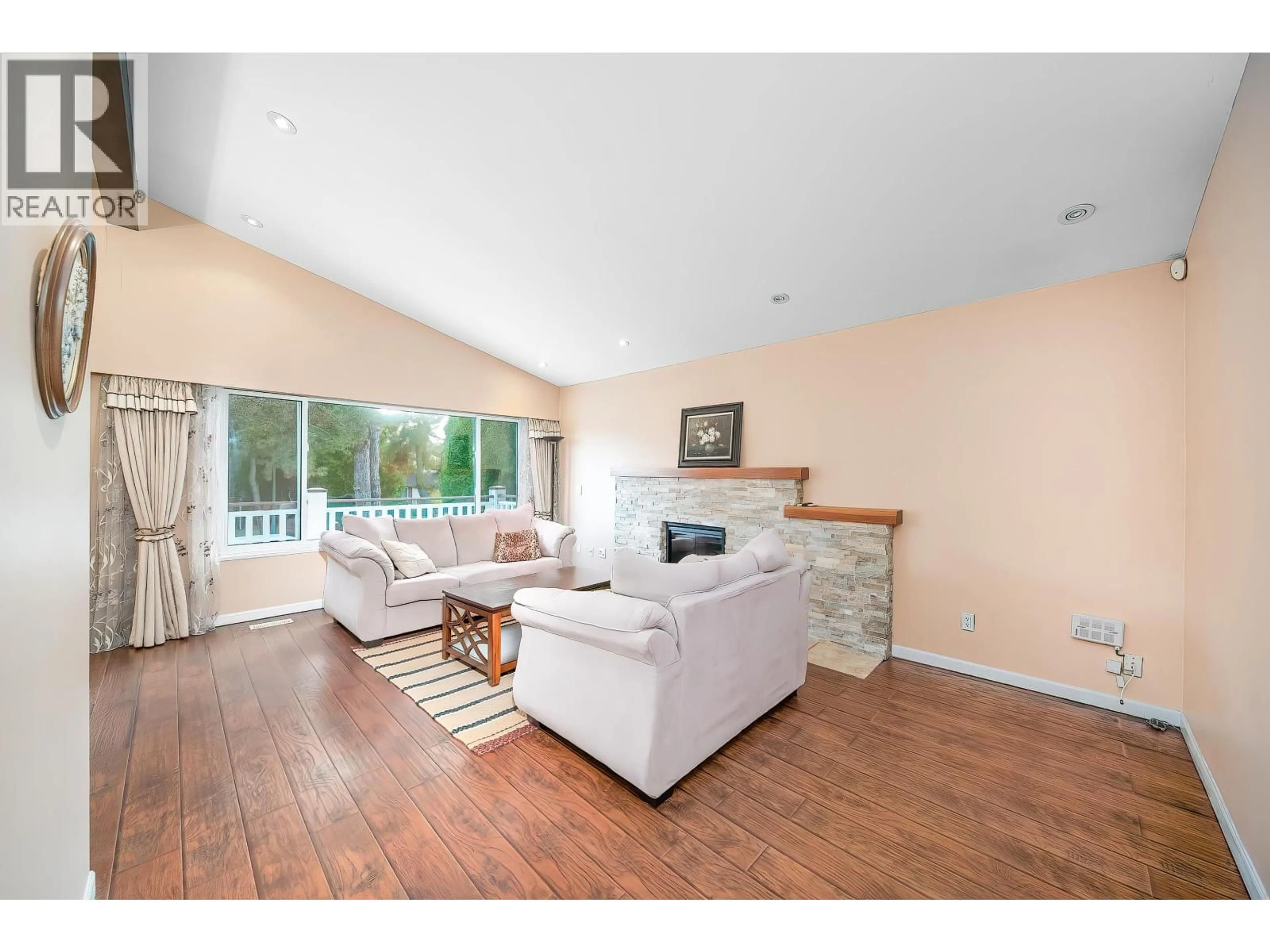 Living room with furniture, wood/laminate floor for 10751 MERSEY DRIVE, Richmond British Columbia V7A3N5