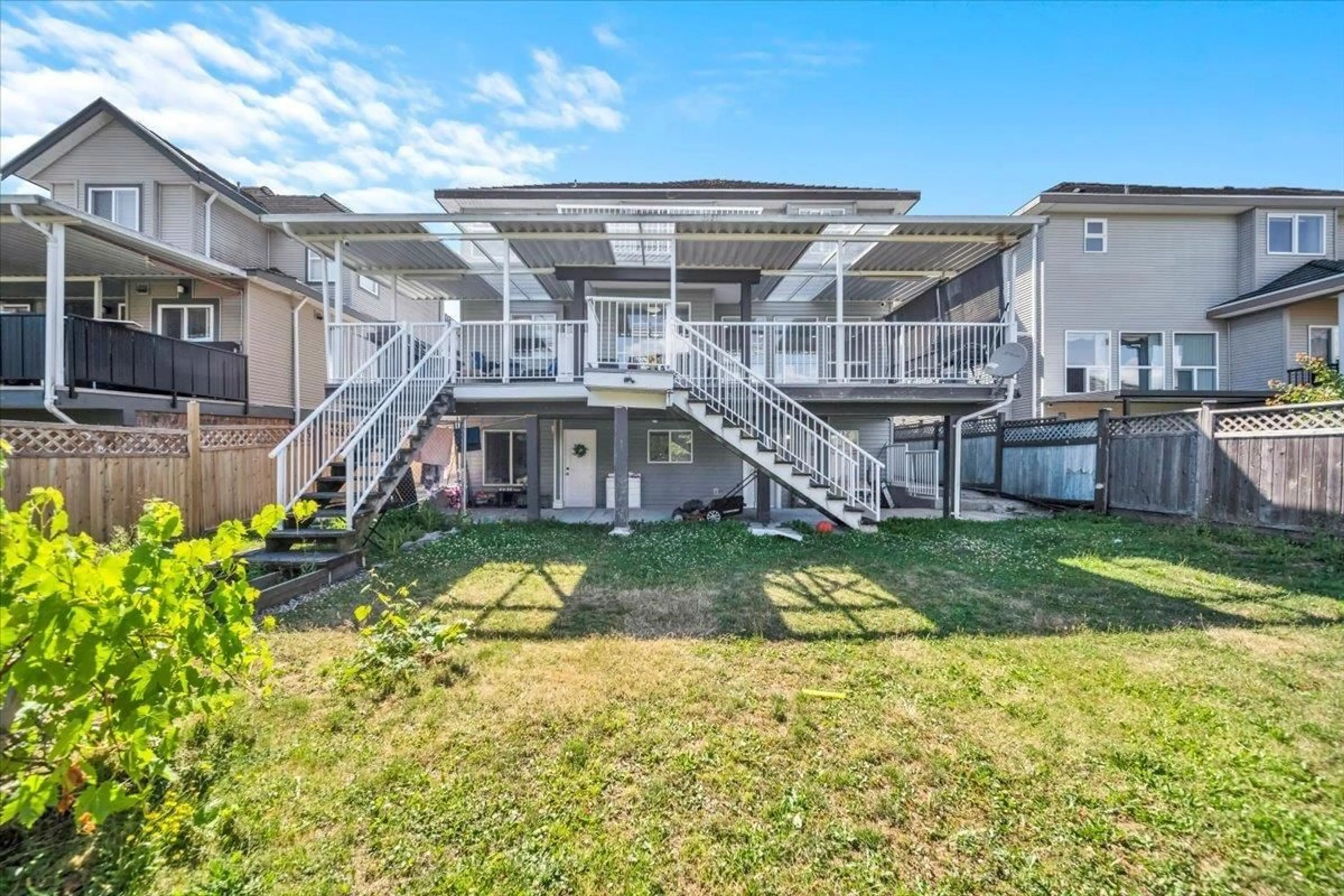 A pic from outside/outdoor area/front of a property/back of a property/a pic from drone, unknown for 7432 148 STREET, Surrey British Columbia V3S3E7