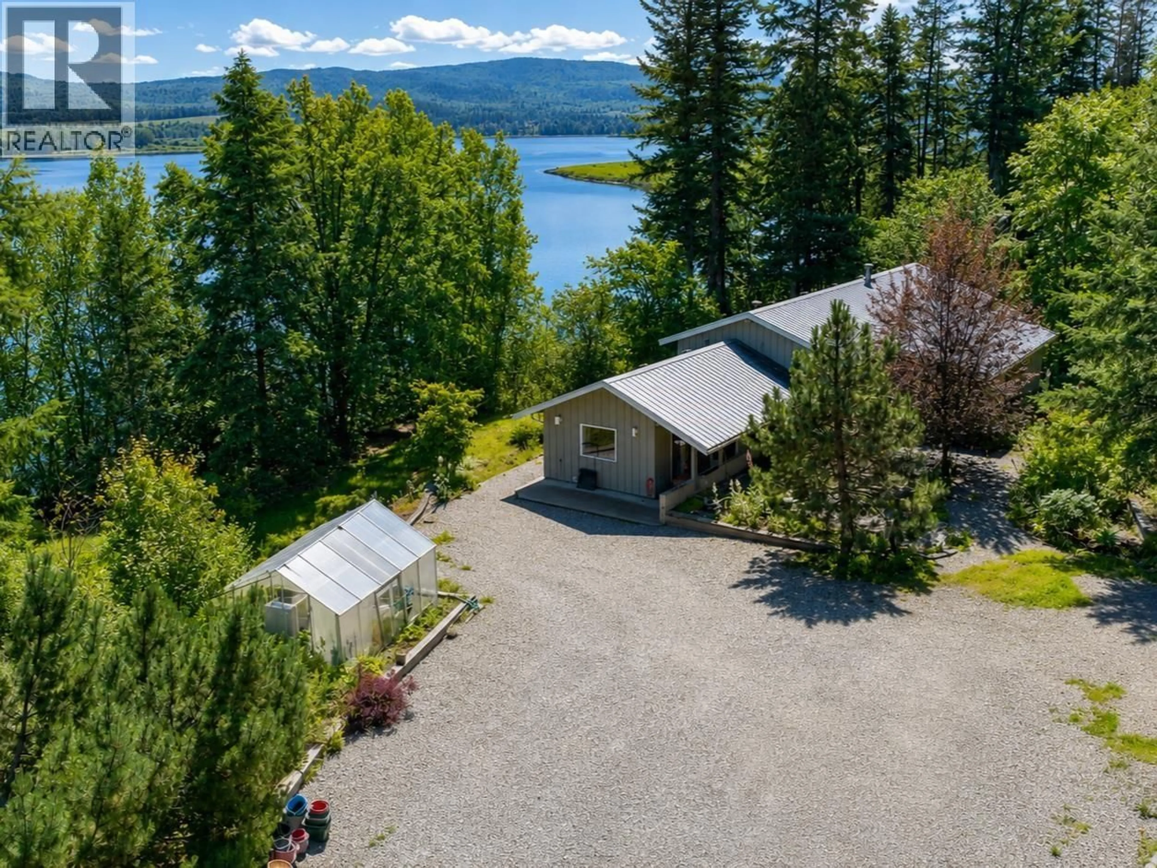 A pic from outside/outdoor area/front of a property/back of a property/a pic from drone, water/lake/river/ocean view for 1996 MARBLE STREET, Quesnel British Columbia V2J4M4
