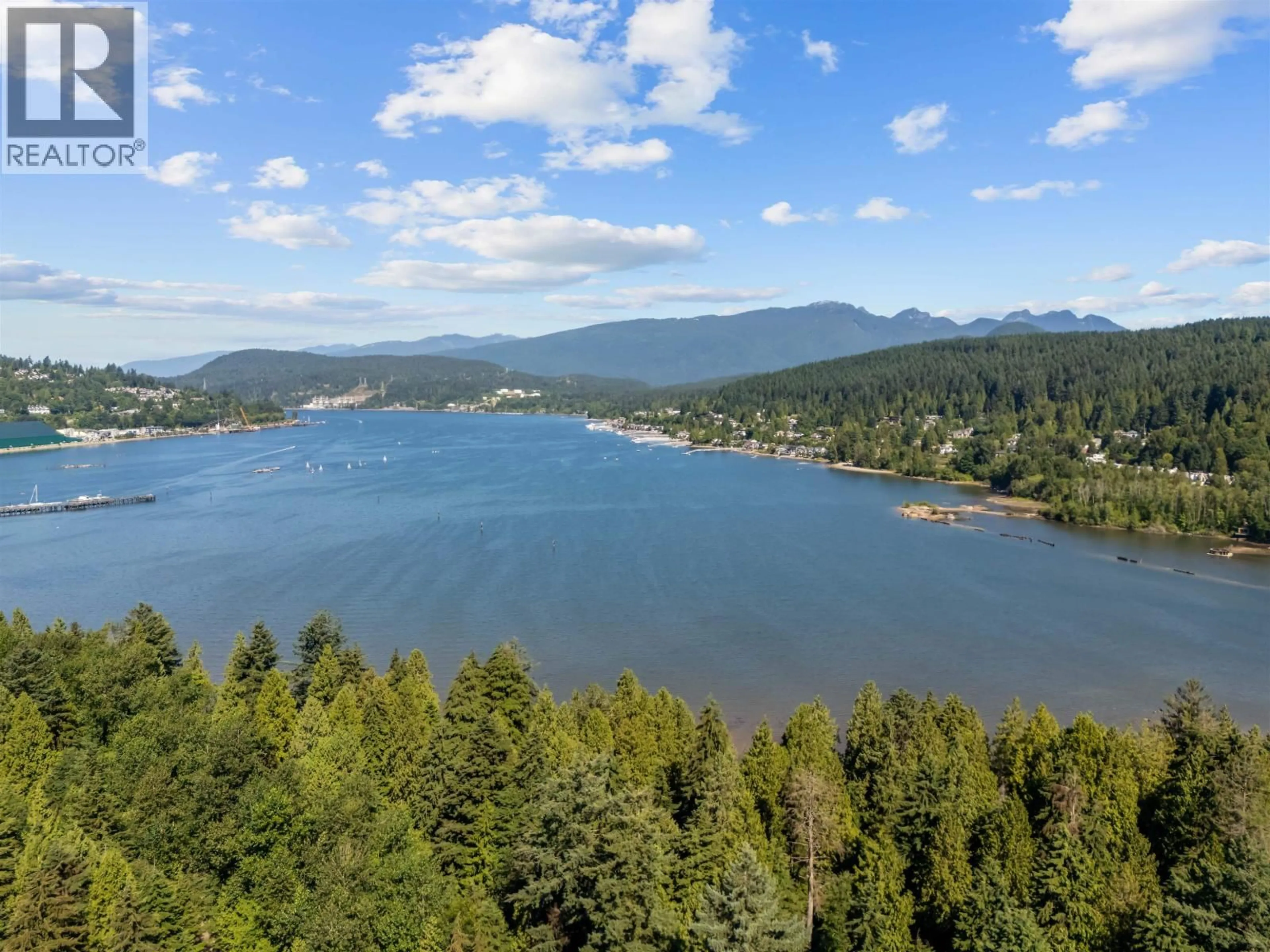 A pic from outside/outdoor area/front of a property/back of a property/a pic from drone, water/lake/river/ocean view for 208 - 500 KLAHANIE DRIVE, Port Moody British Columbia V3H5L1
