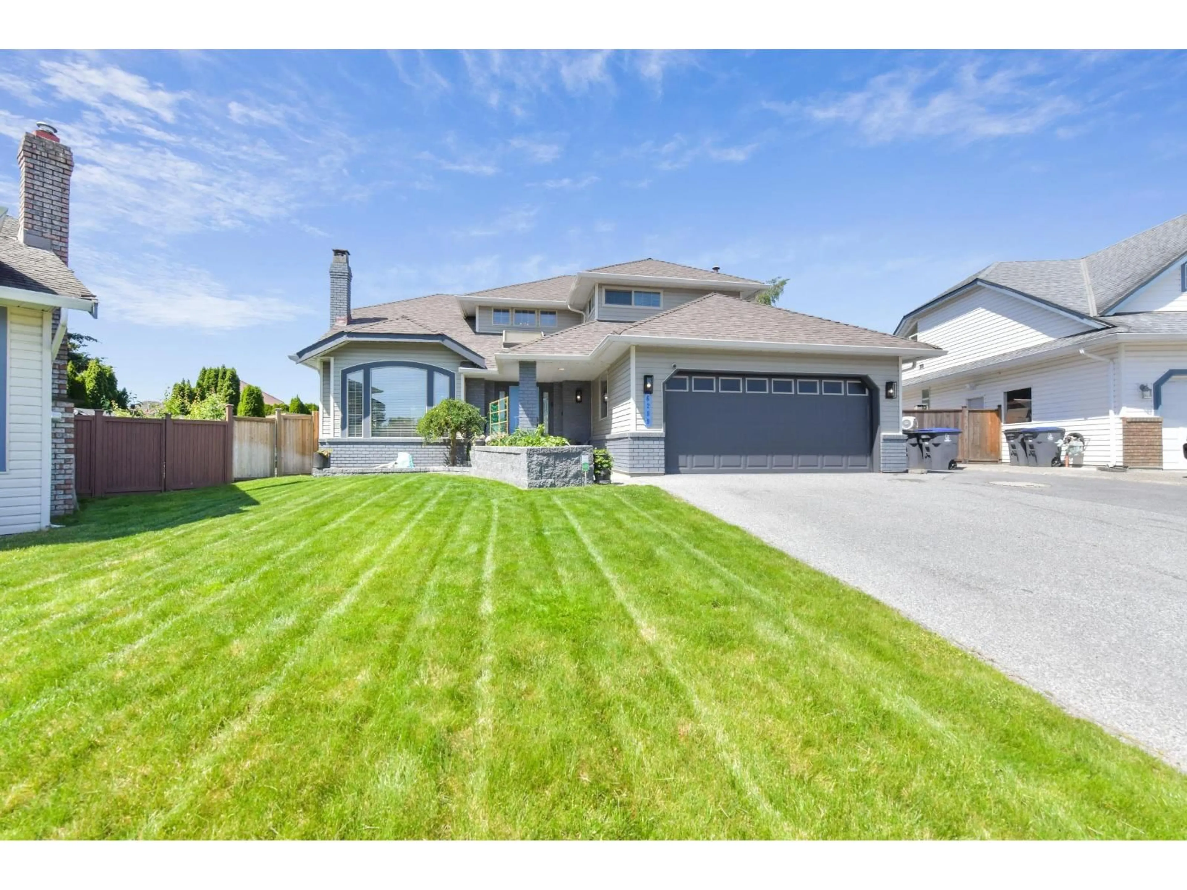 Home with vinyl exterior material, street for 6289 187 STREET, Surrey British Columbia V3S7N8