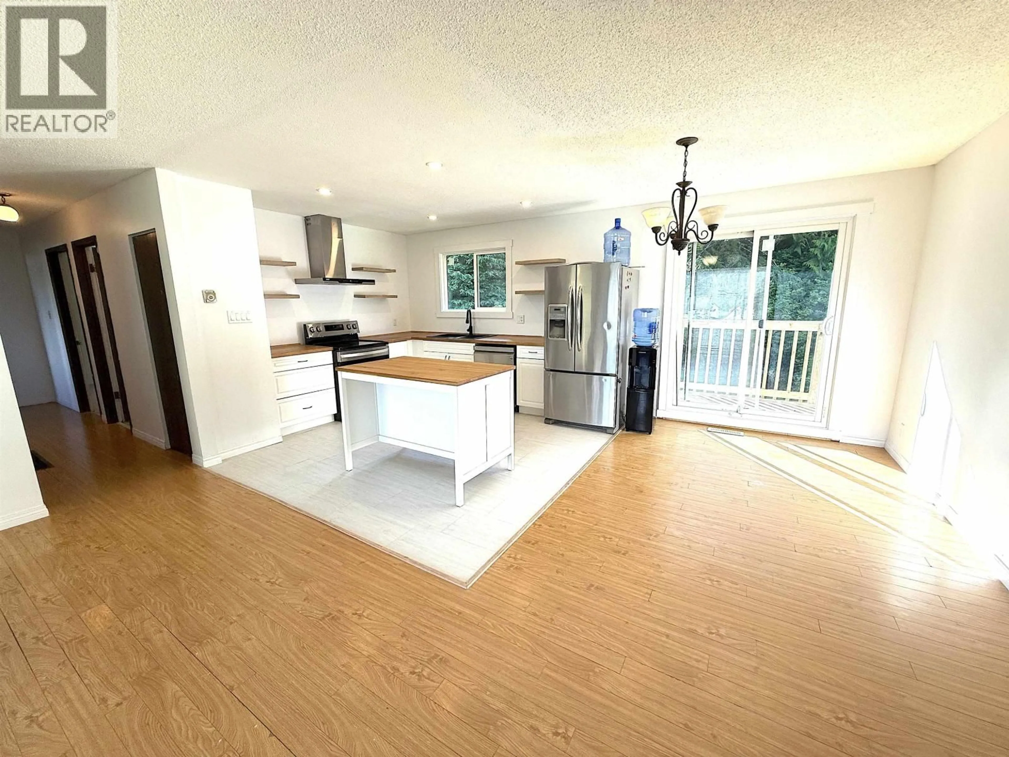 Open concept kitchen, wood/laminate floor for 1012 10TH AVENUE, Prince Rupert British Columbia V8J2T5