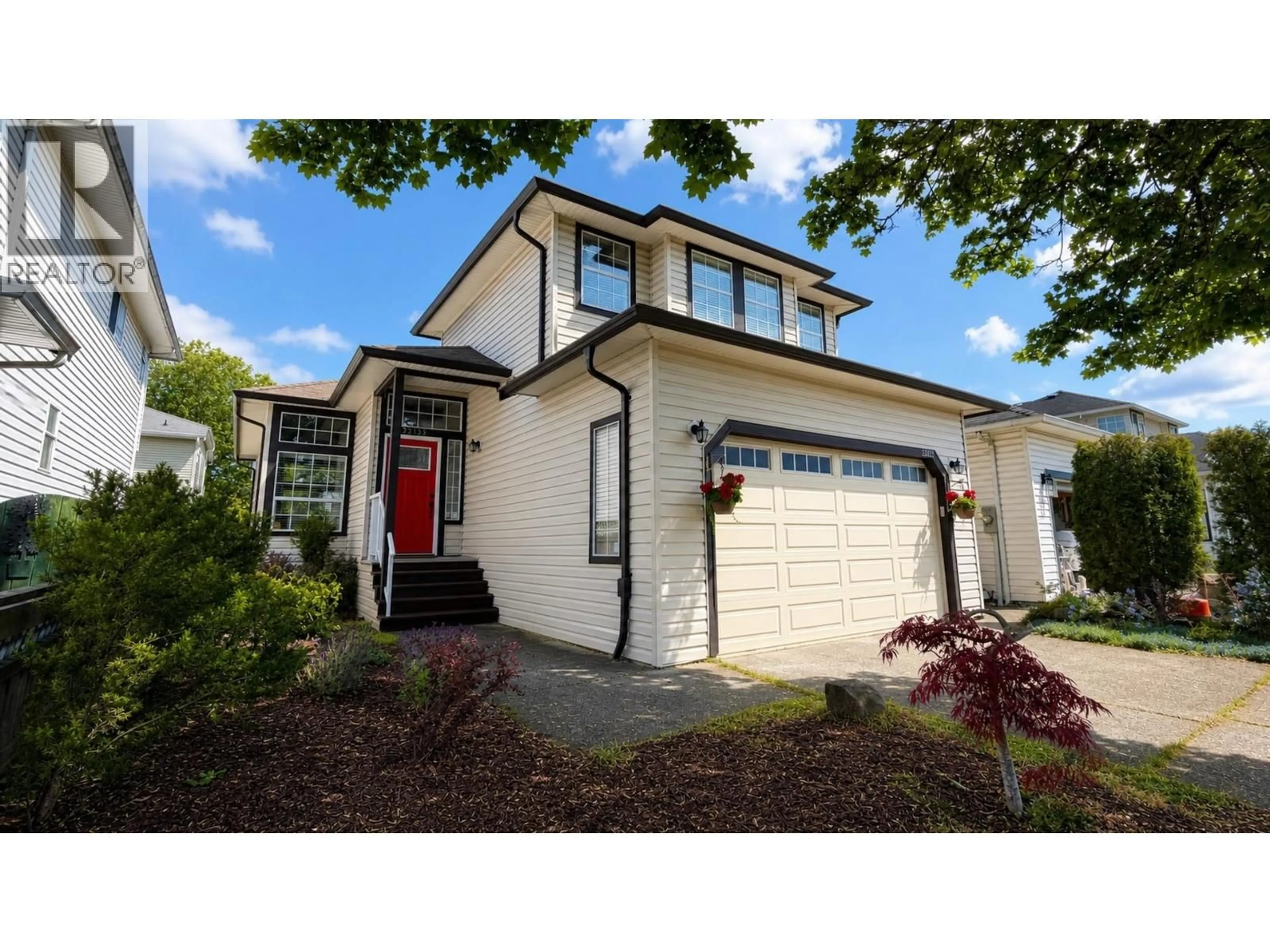 Home with vinyl exterior material, street for 22135 GARRATT DRIVE, Richmond British Columbia V6V2P4
