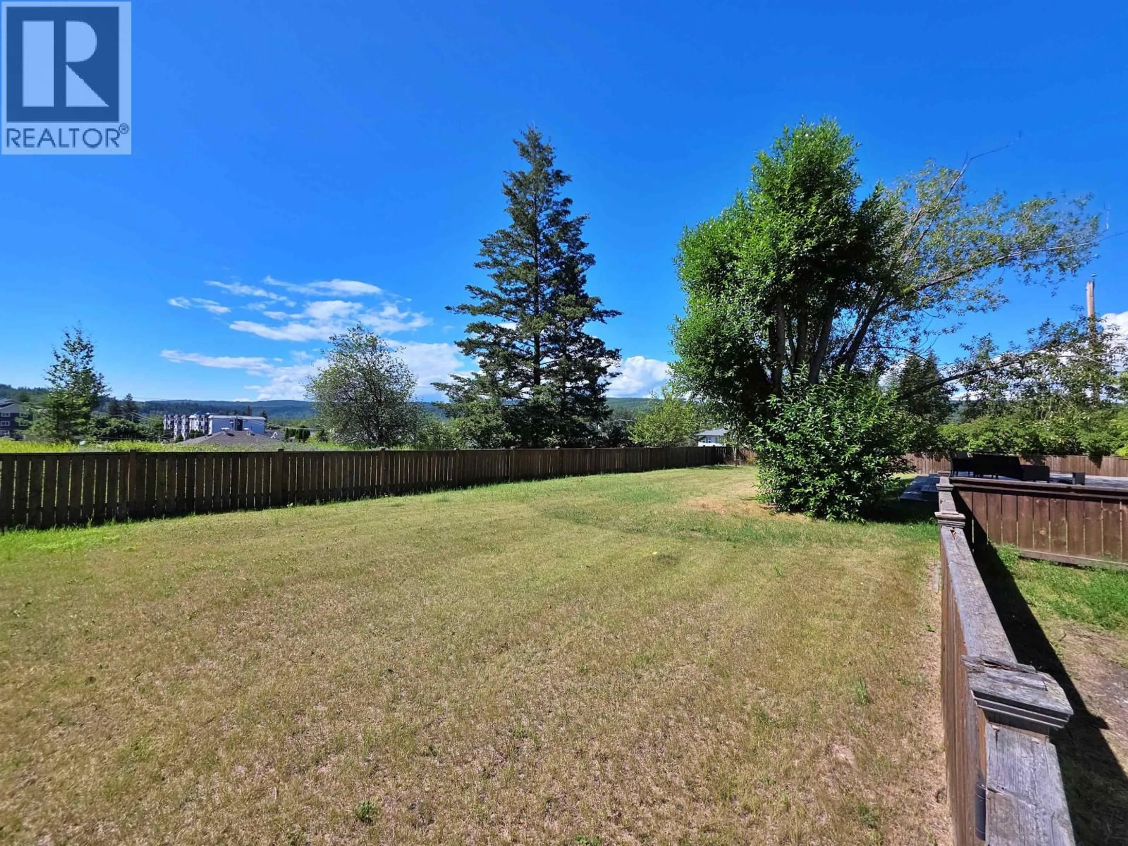 A pic from outside/outdoor area/front of a property/back of a property/a pic from drone, water/lake/river/ocean view for 736 REID STREET, Quesnel British Columbia V2J2N4