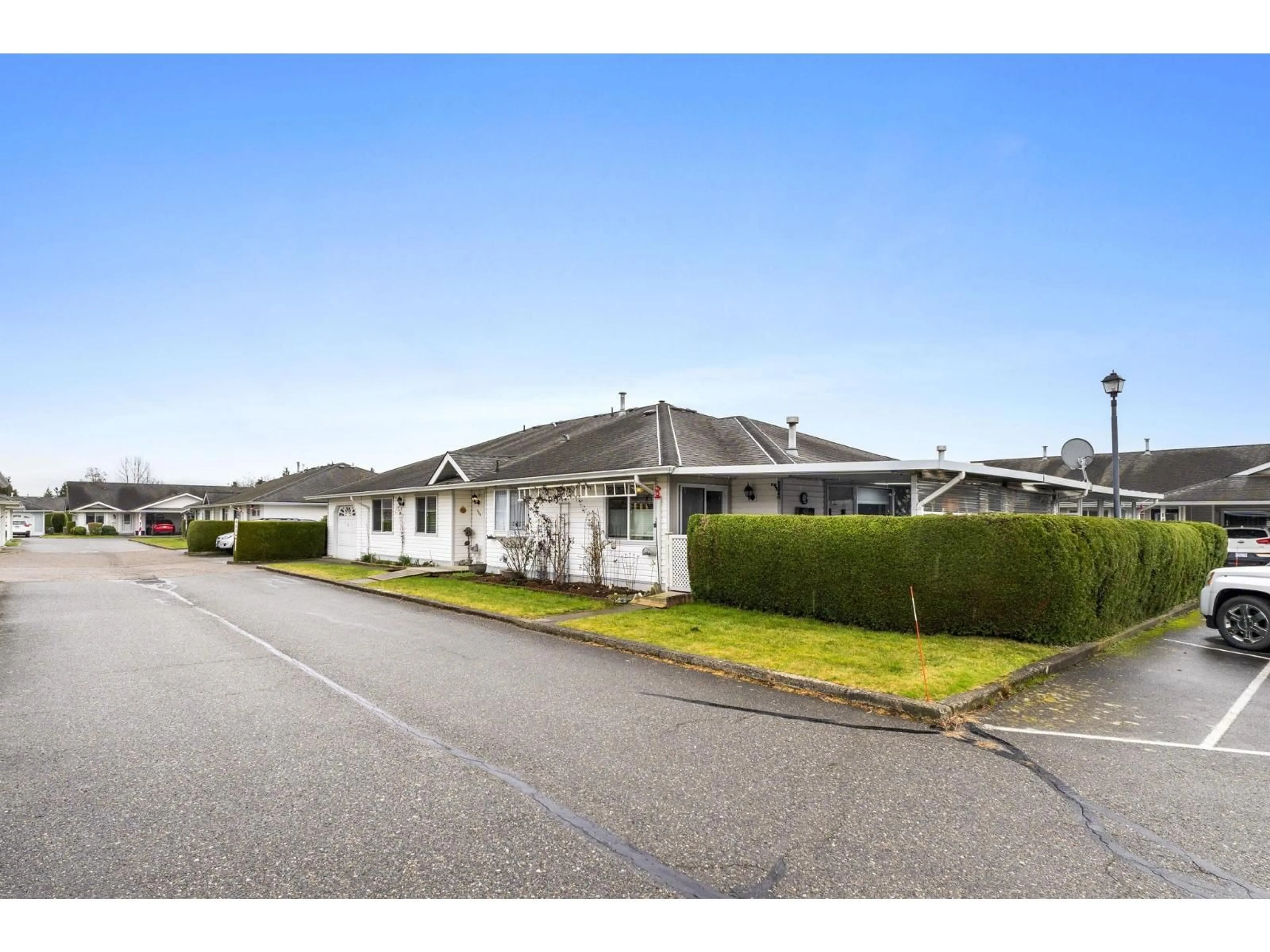 A pic from outside/outdoor area/front of a property/back of a property/a pic from drone, street for 134 - 7610 EVANS ROAD, Chilliwack British Columbia V2R2T4