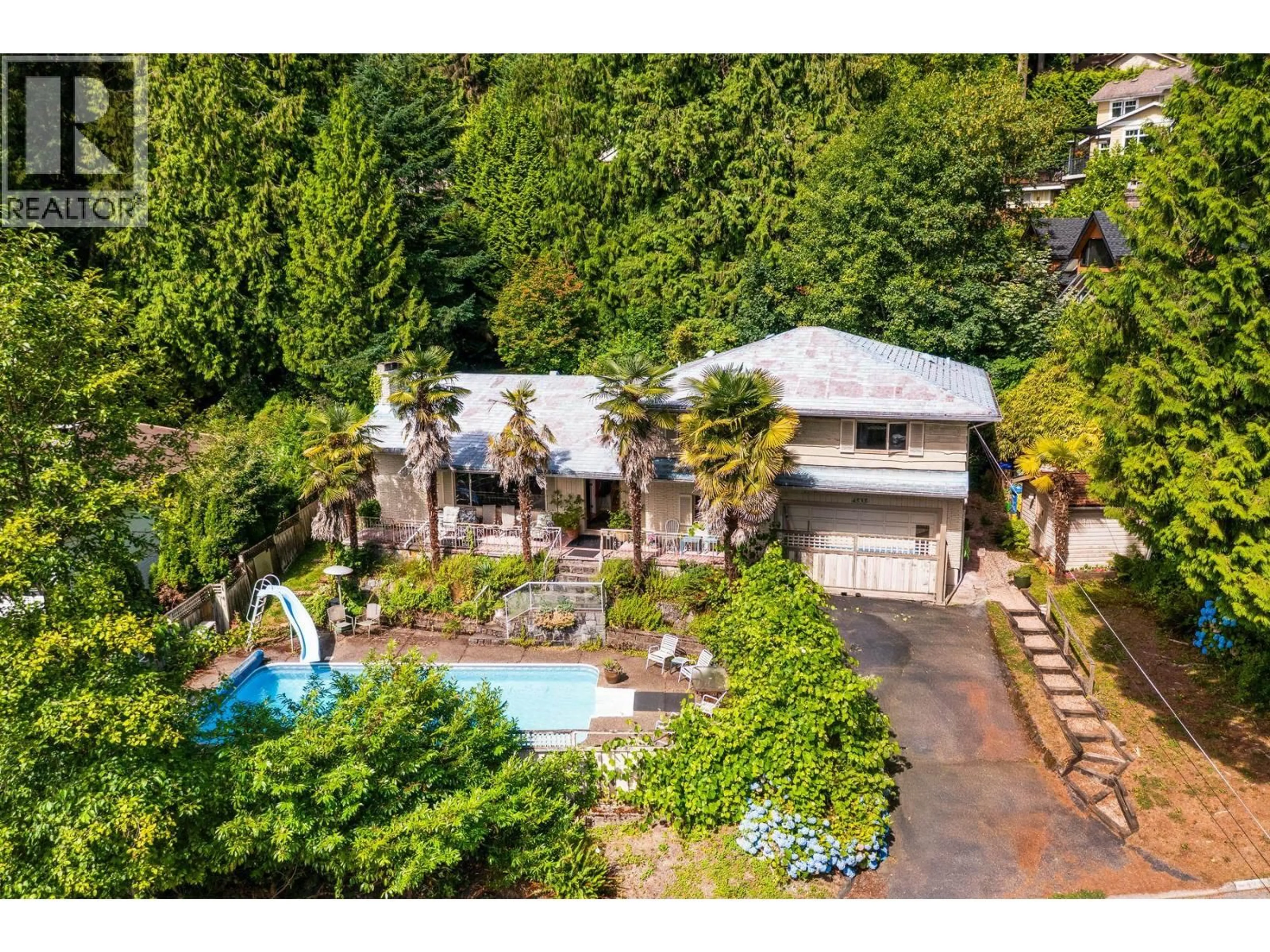 A pic from outside/outdoor area/front of a property/back of a property/a pic from drone, unknown for 4535 MOUNTAIN HIGHWAY, North Vancouver British Columbia V7K2K7