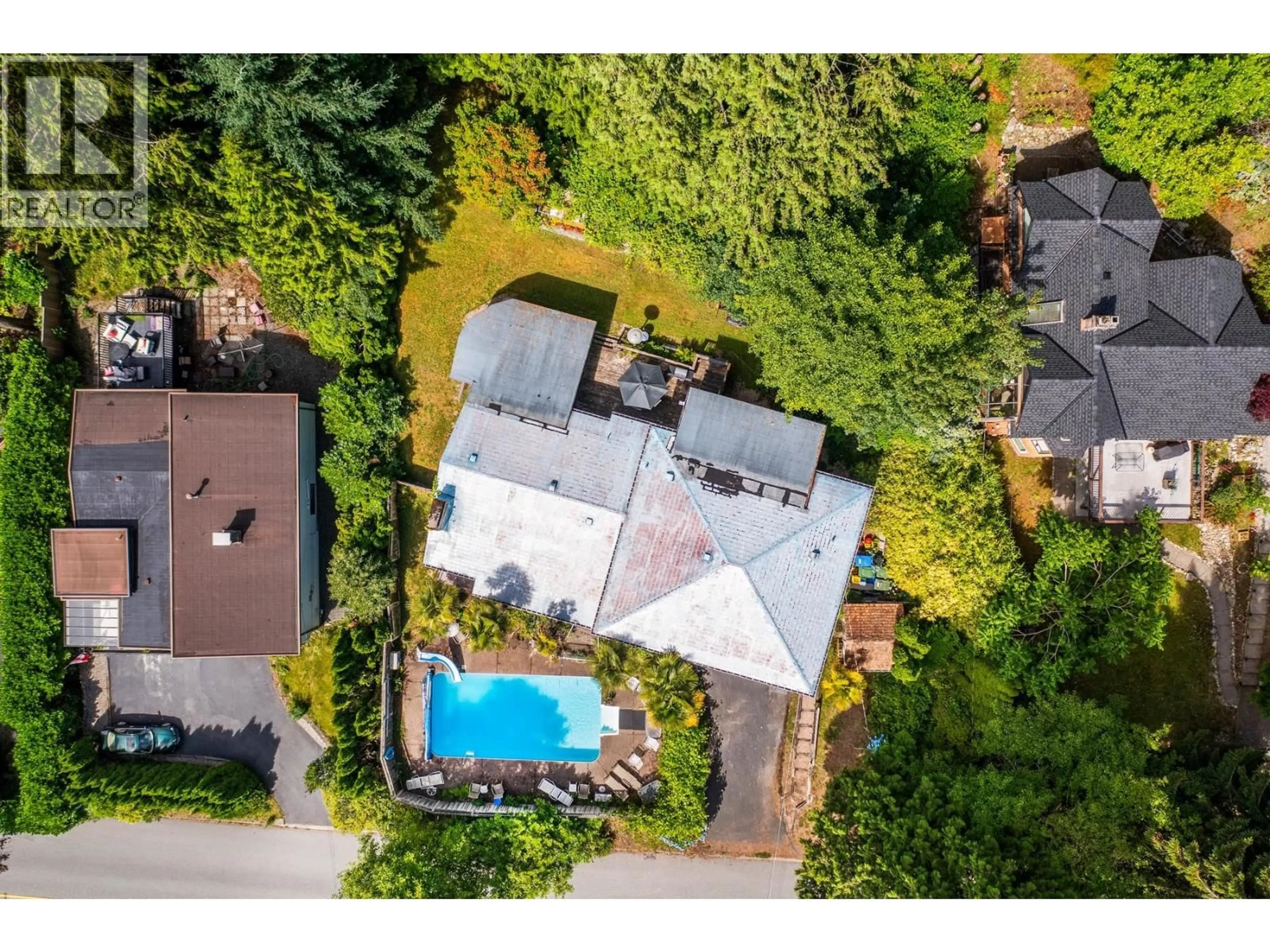 A pic from outside/outdoor area/front of a property/back of a property/a pic from drone, street for 4535 MOUNTAIN HIGHWAY, North Vancouver British Columbia V7K2K7