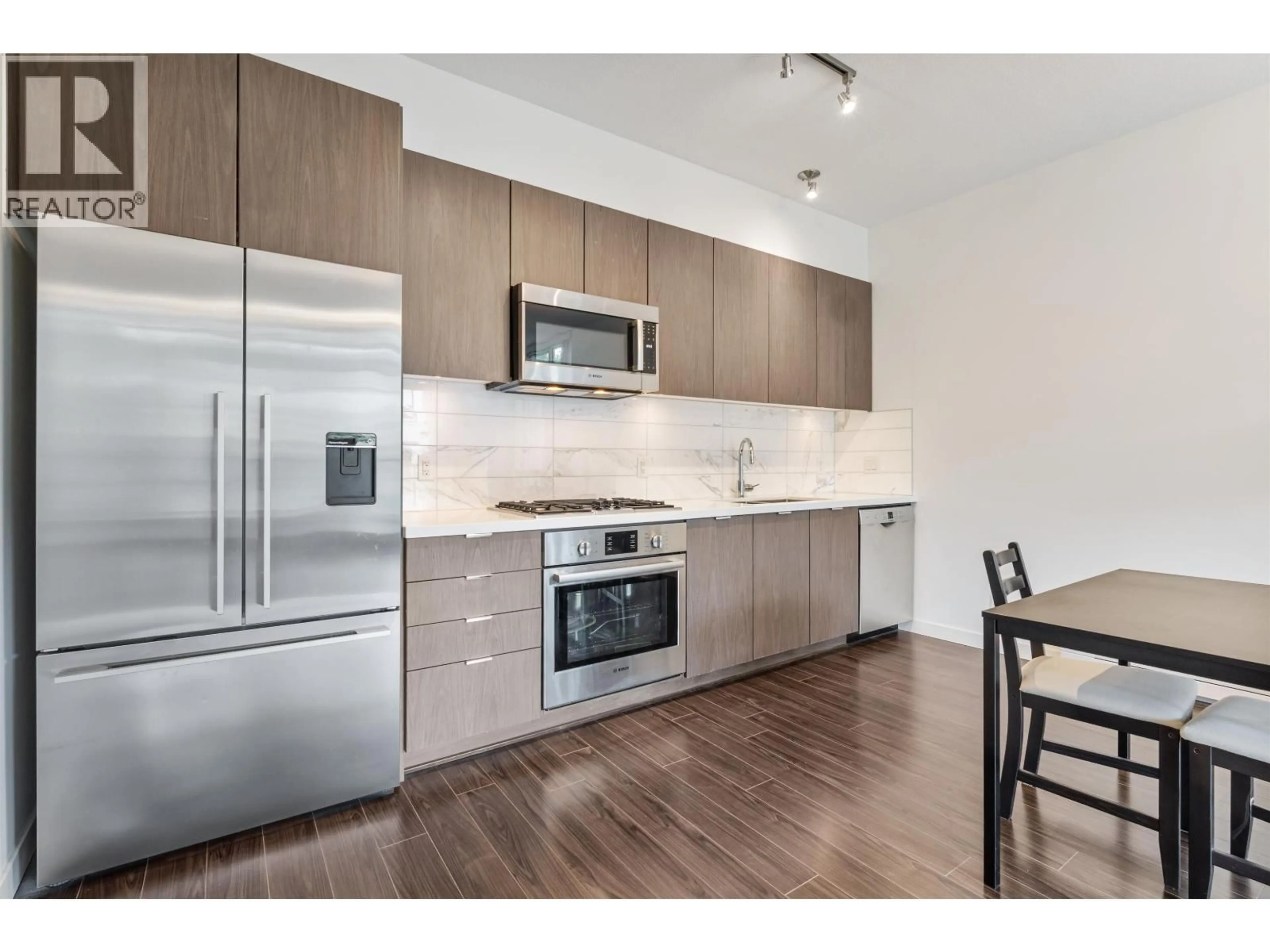 Standard kitchen, wood/laminate floor for 301 - 3168 RIVERWALK AVENUE, Vancouver British Columbia V5S0B8
