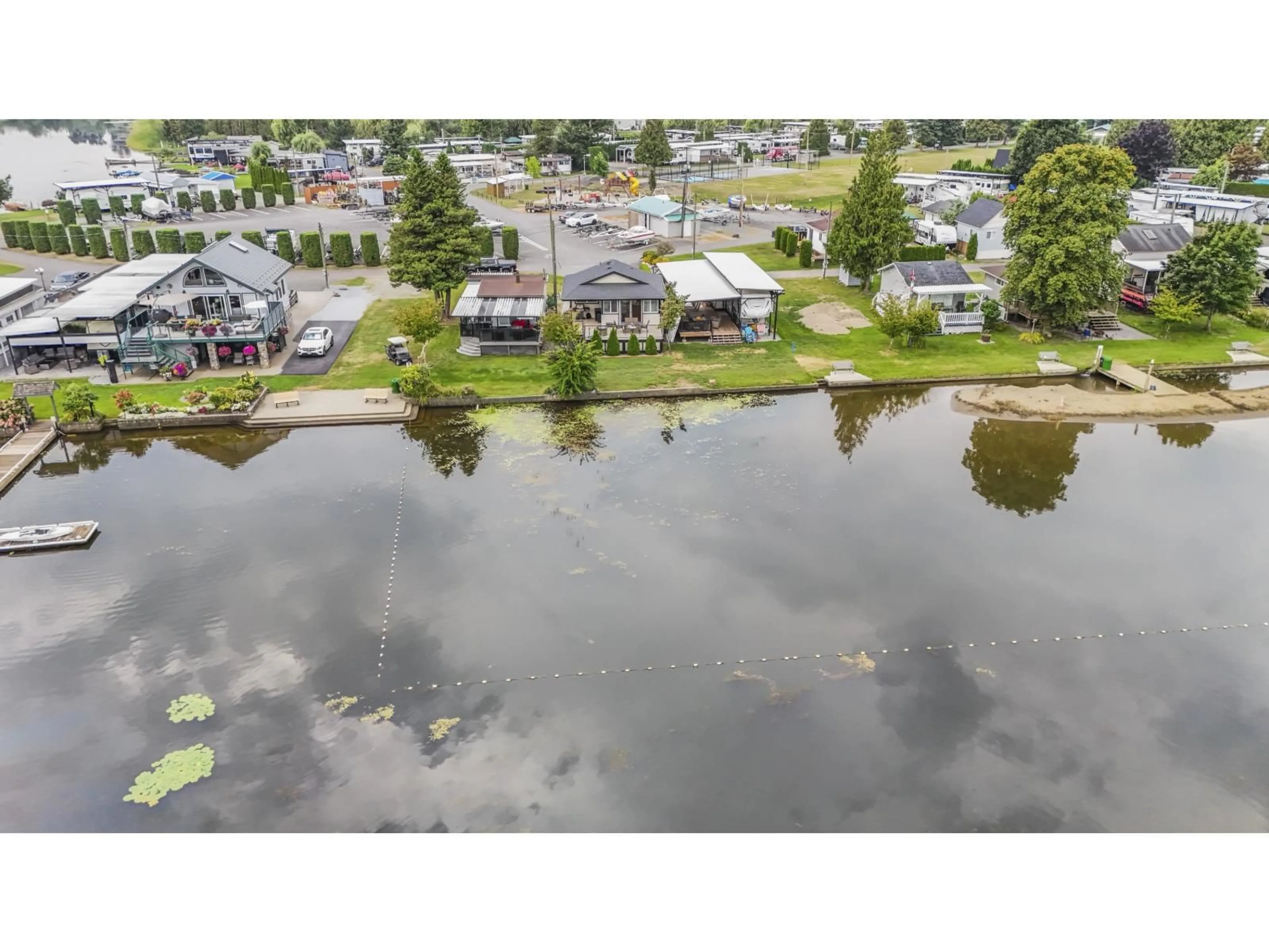 A pic from outside/outdoor area/front of a property/back of a property/a pic from drone, water/lake/river/ocean view for 149 152 - 8400 SHOOK ROAD, Mission British Columbia V2V7L3